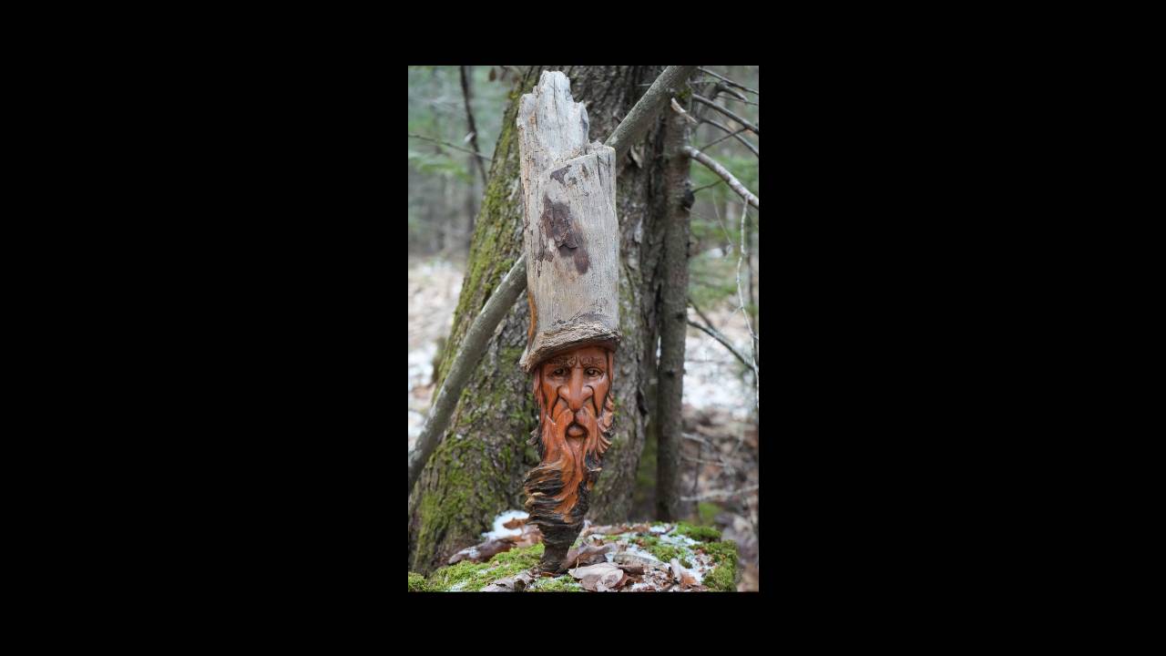 SOLD Face carving in pine knot