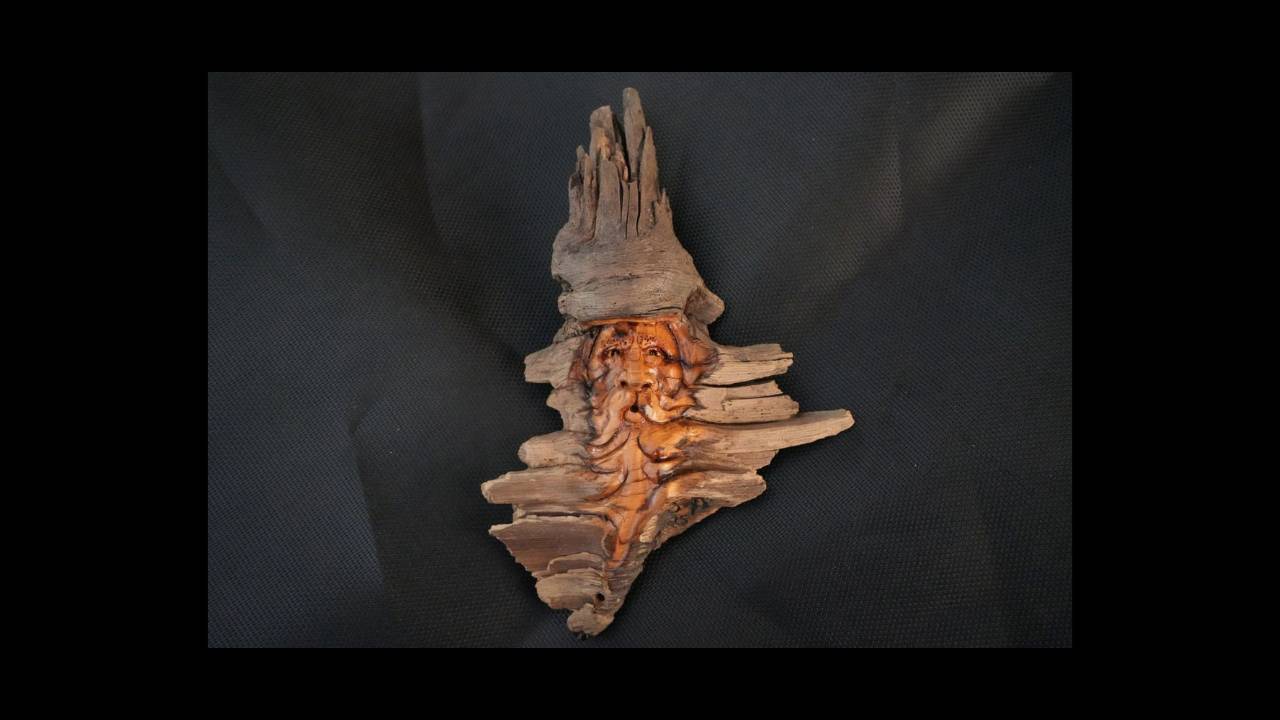 SOLD Face carving in pine knot