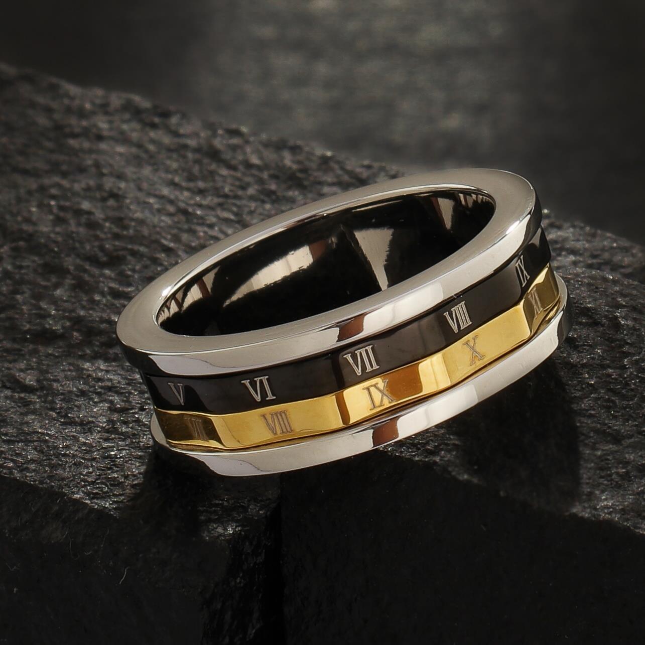 ANEL DE AÇO INOX E SÍMBOLOS EM ALGORISMOS ROMANOS GIRATÓRIOS