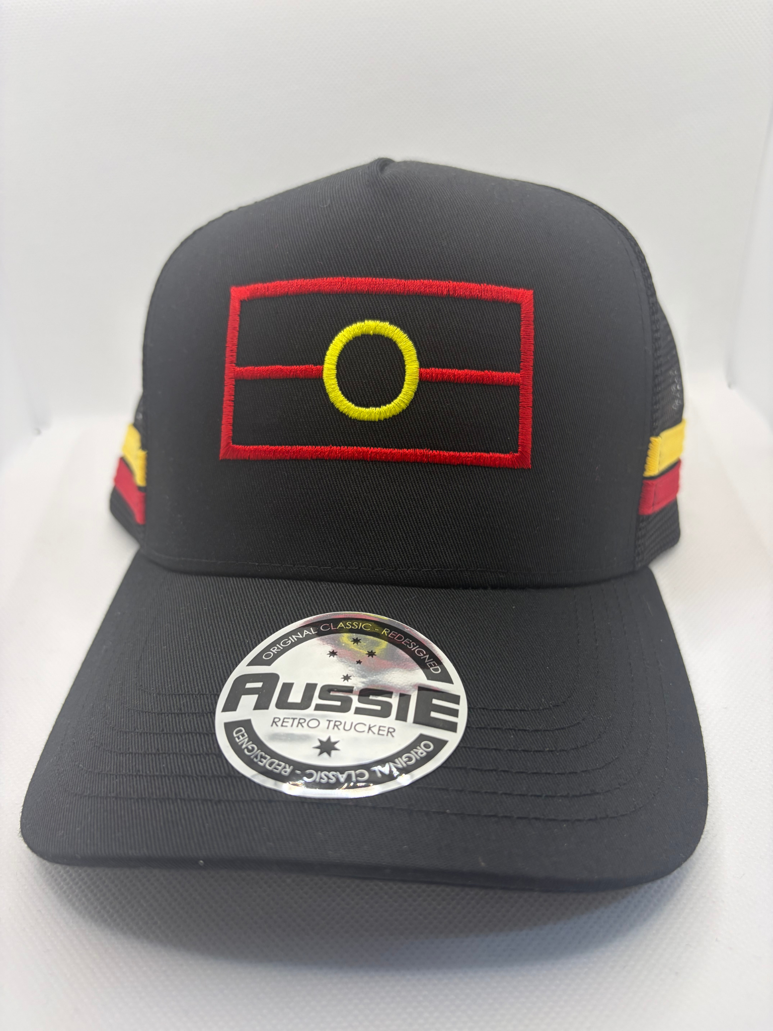 Aboriginal Flag Embroidered on Black Trucker Cap with Yellow/Red Side Stripes