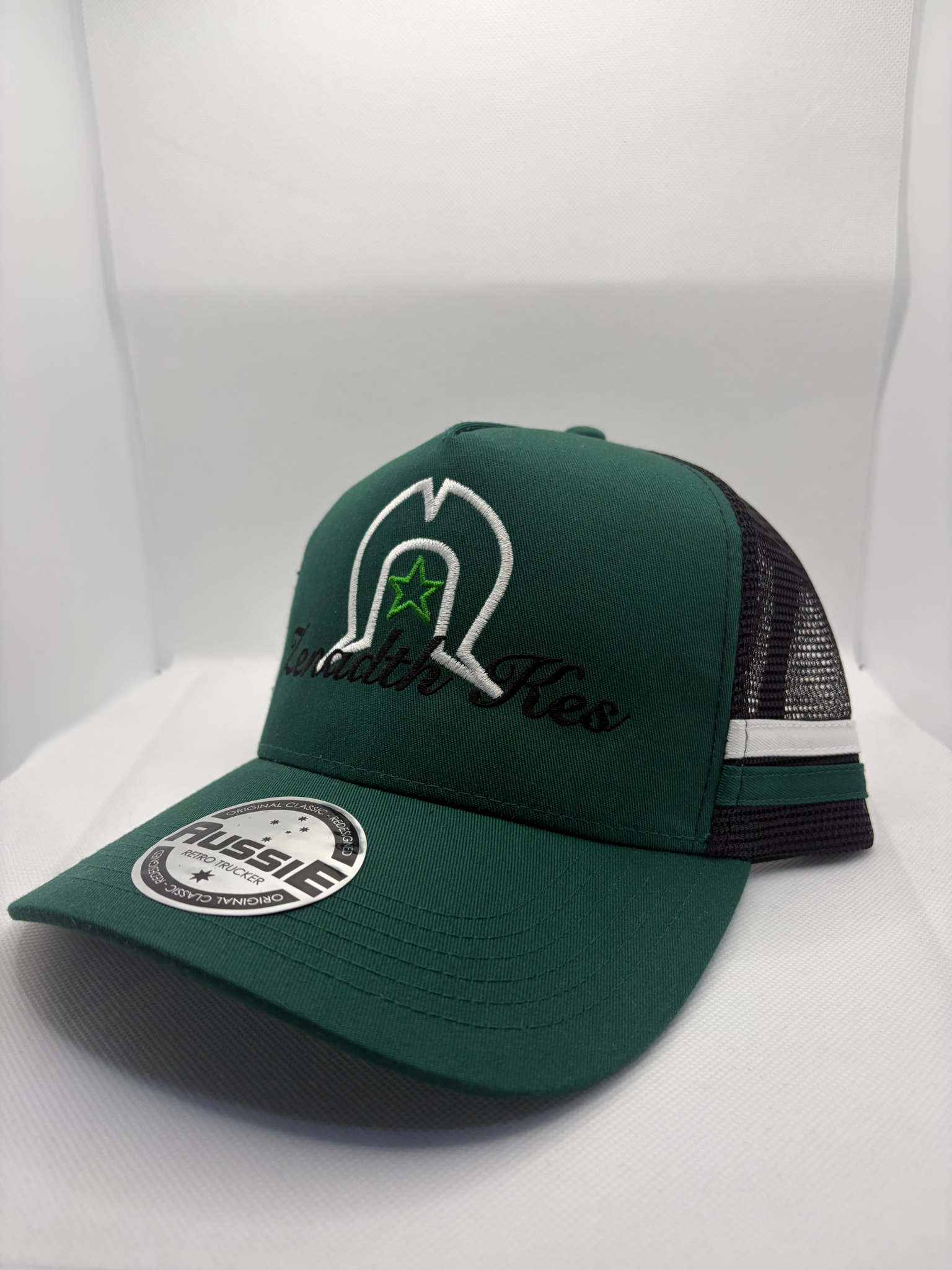 Torres Strait Island Dhoeri with Star and Zenadth Kes Embroidered on Green/Black Trucker Cap with White/Green Side Stripes
