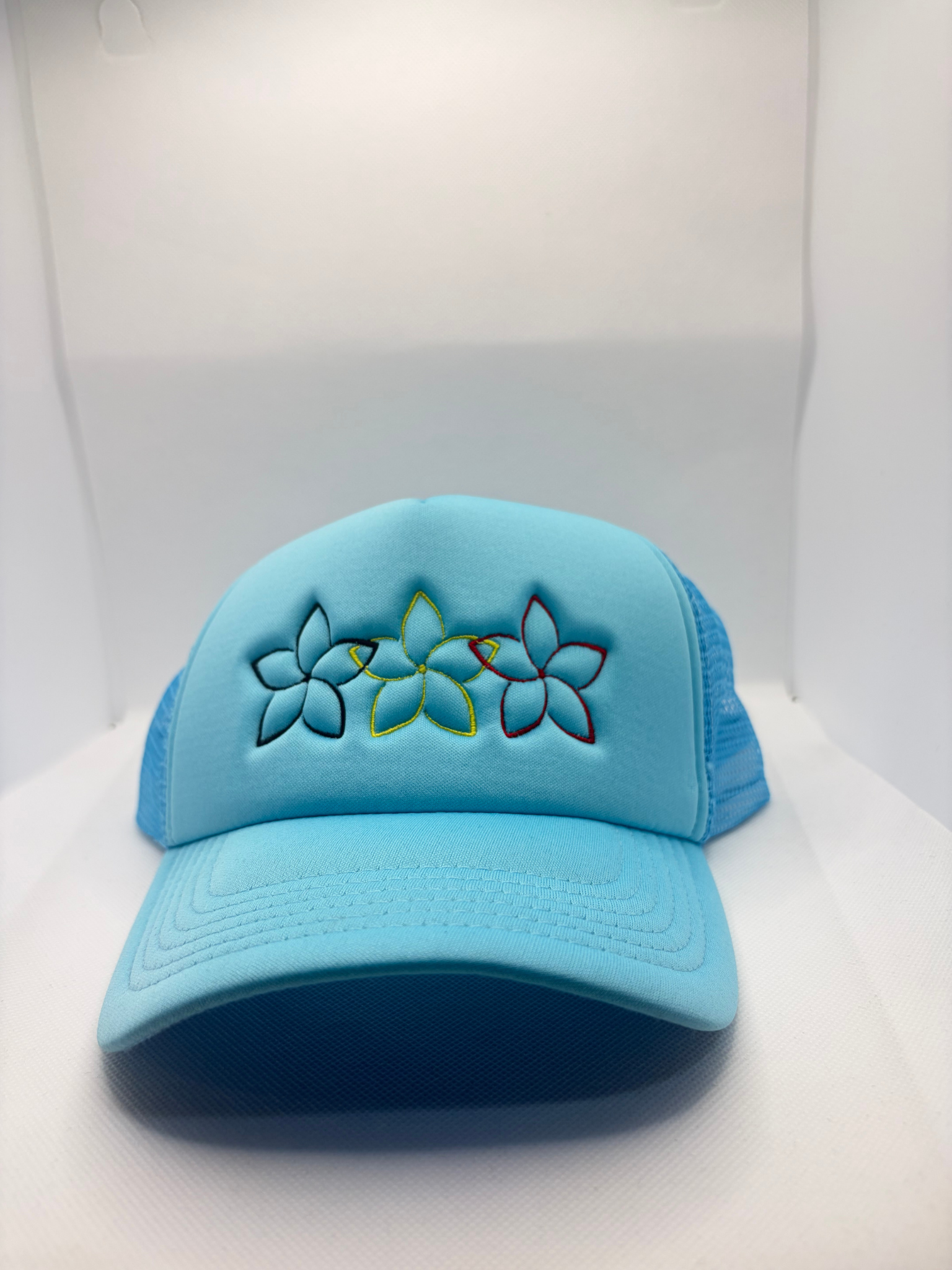 Black, Yellow & Red Flowers Embroidered on Sky Blue Polymesh Trucker Cap