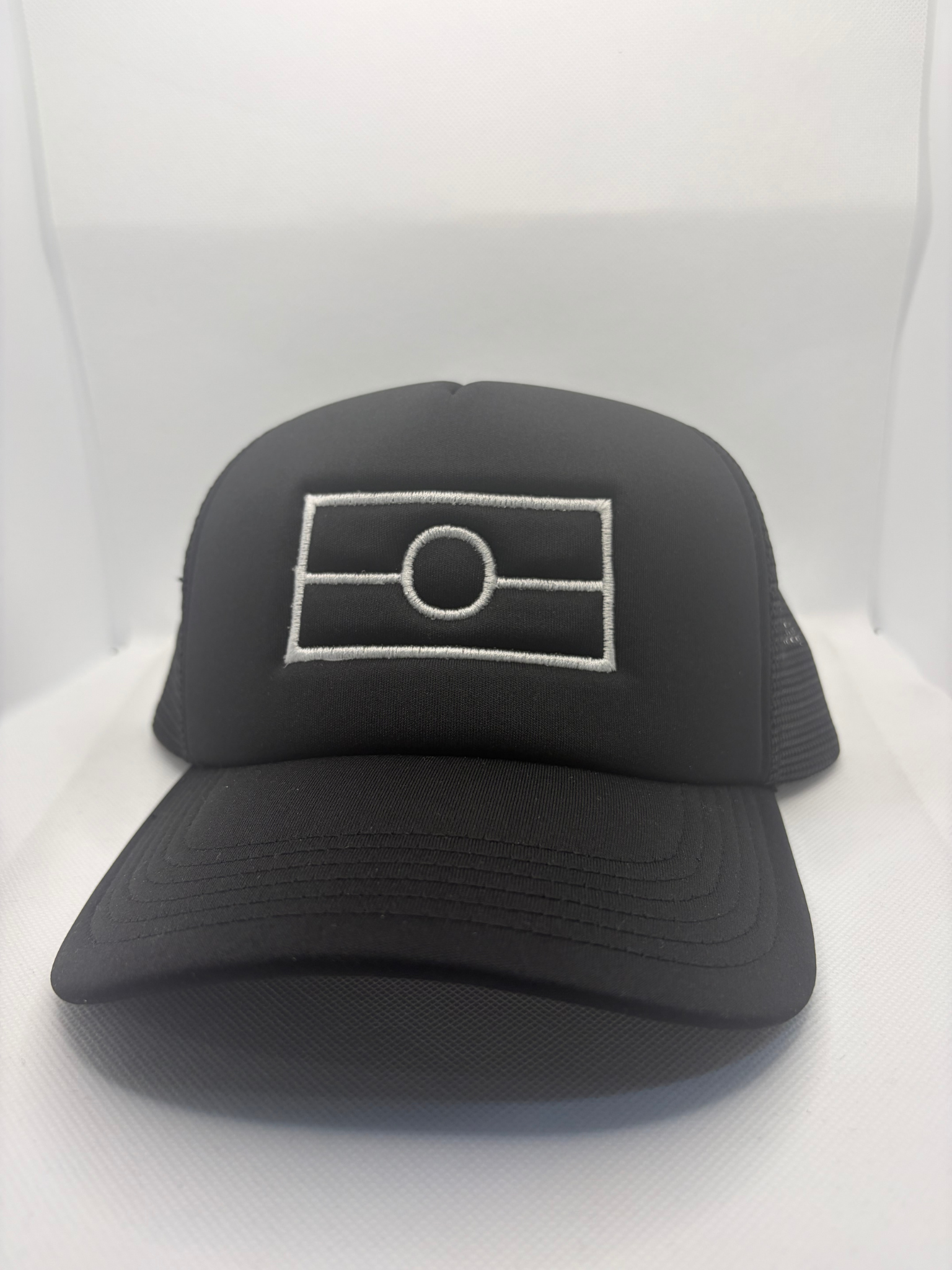 Aboriginal Flag embroidered on black polymesh trucker cap