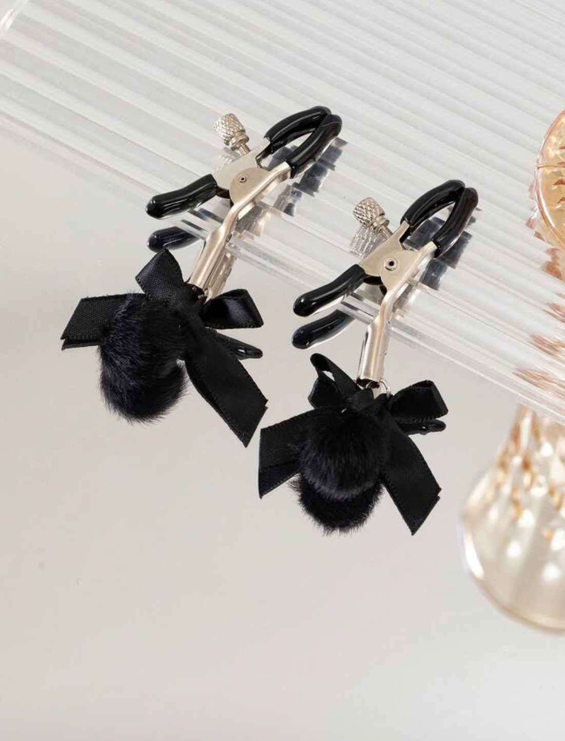 Pinzas para pezones con lazo y pompón