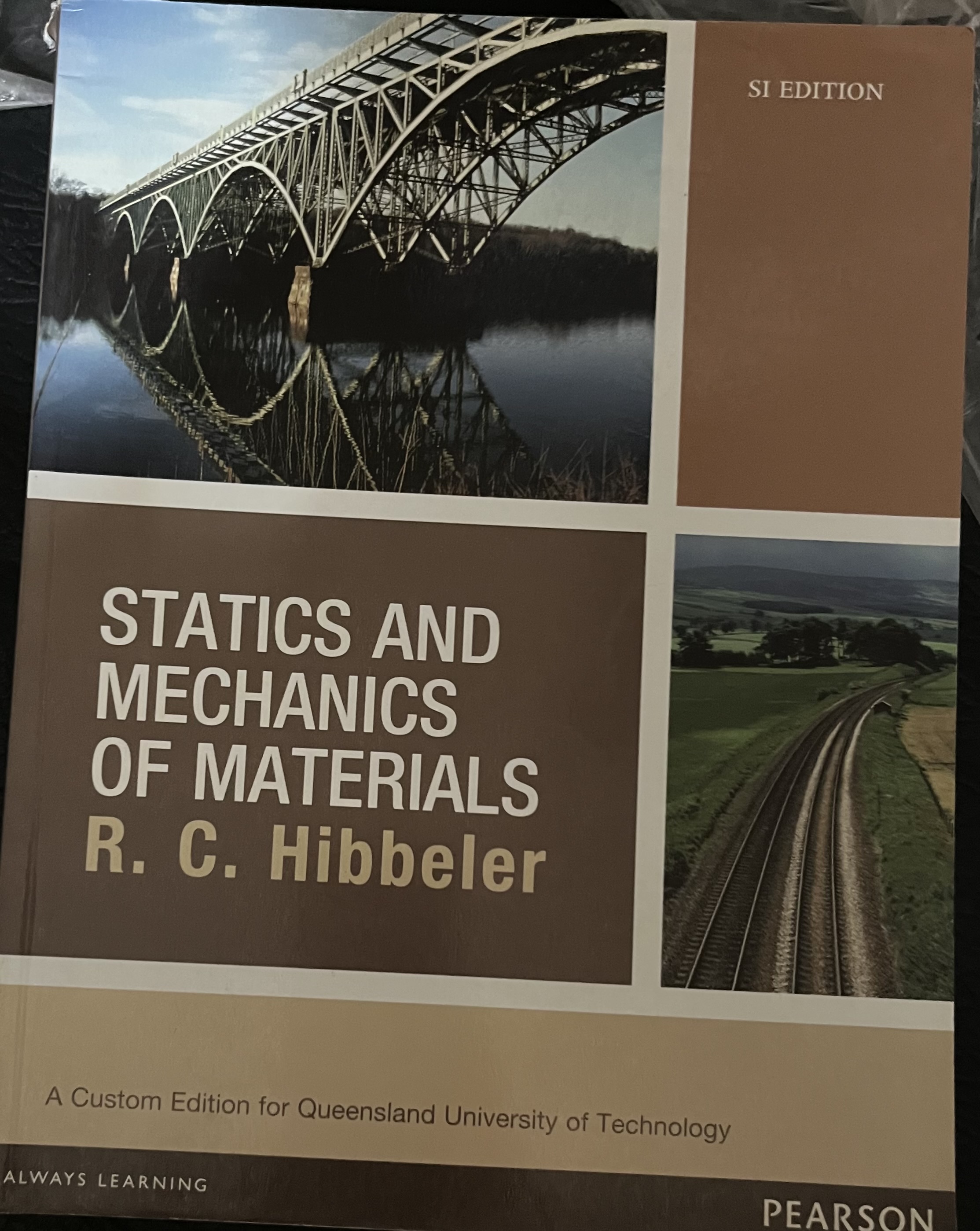 Statics and Mechanics of Materials by R. C. Hibbeler