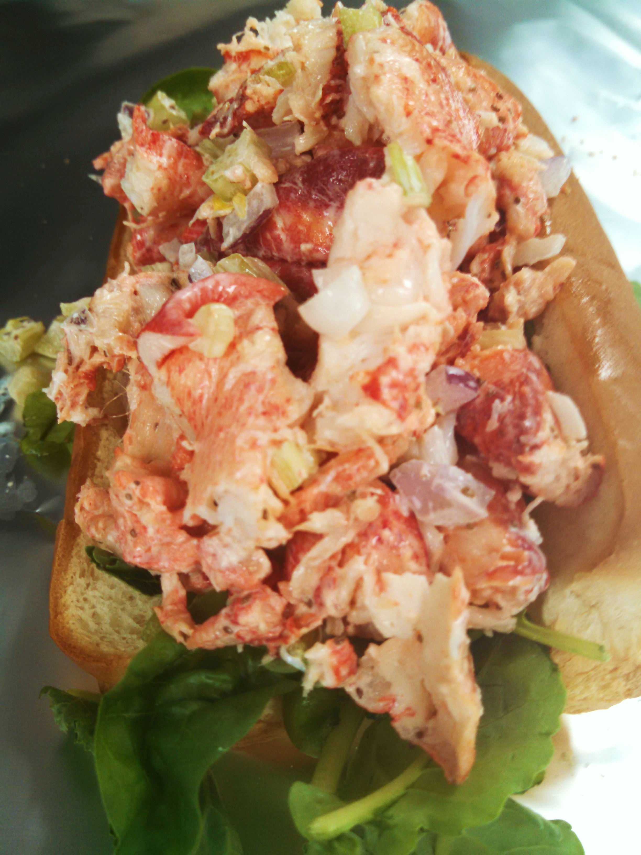 Maine lobster roll with one side  