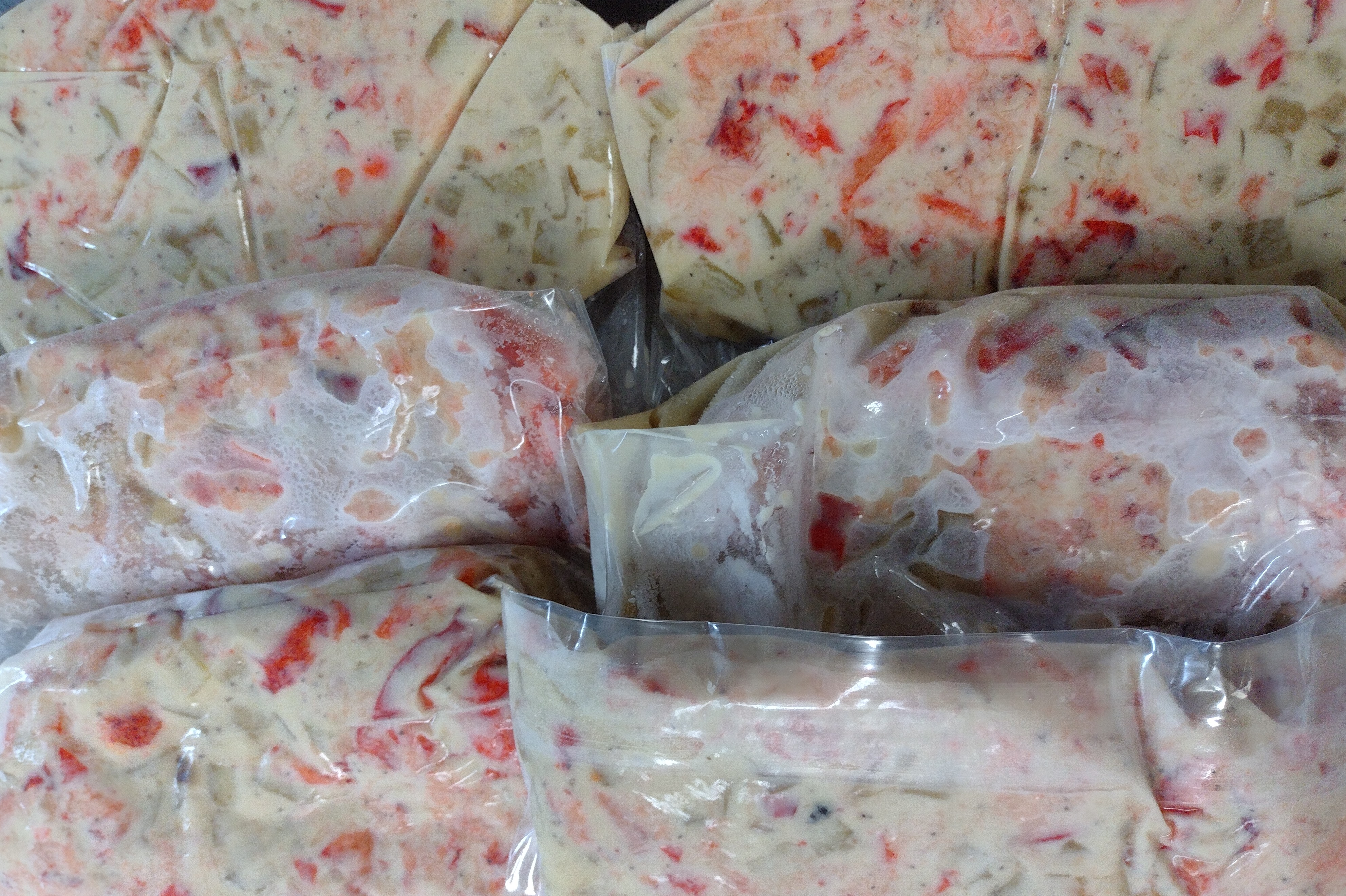 Maine lobster chowder, frozen New England style (12 portions packed two per bag).  