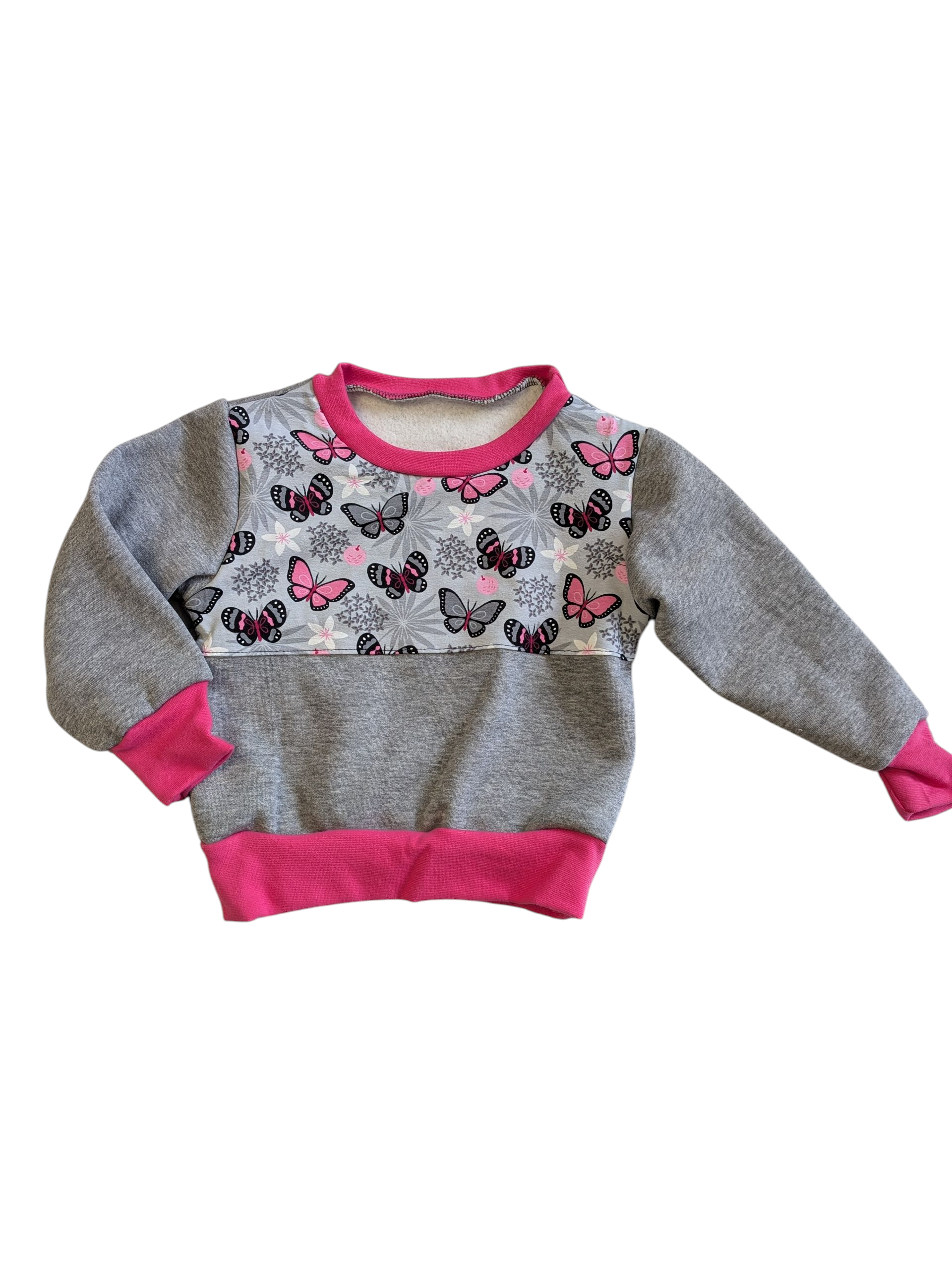 Kinderpullover mit Schmetterlingsmuster in den Größen 74/80 bis 134 aus Jerseystoff 