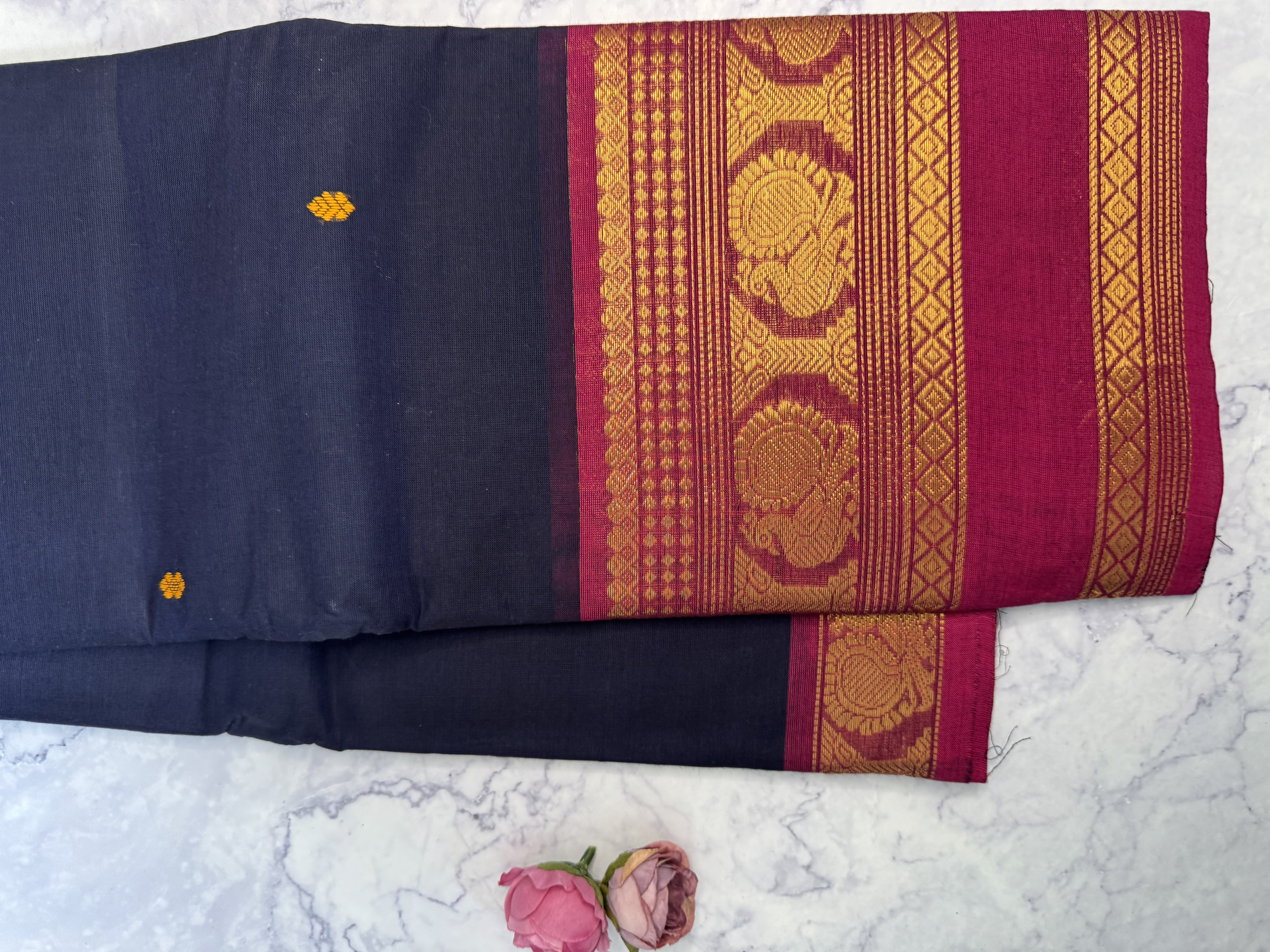 Navy blue cotton saree with pink border