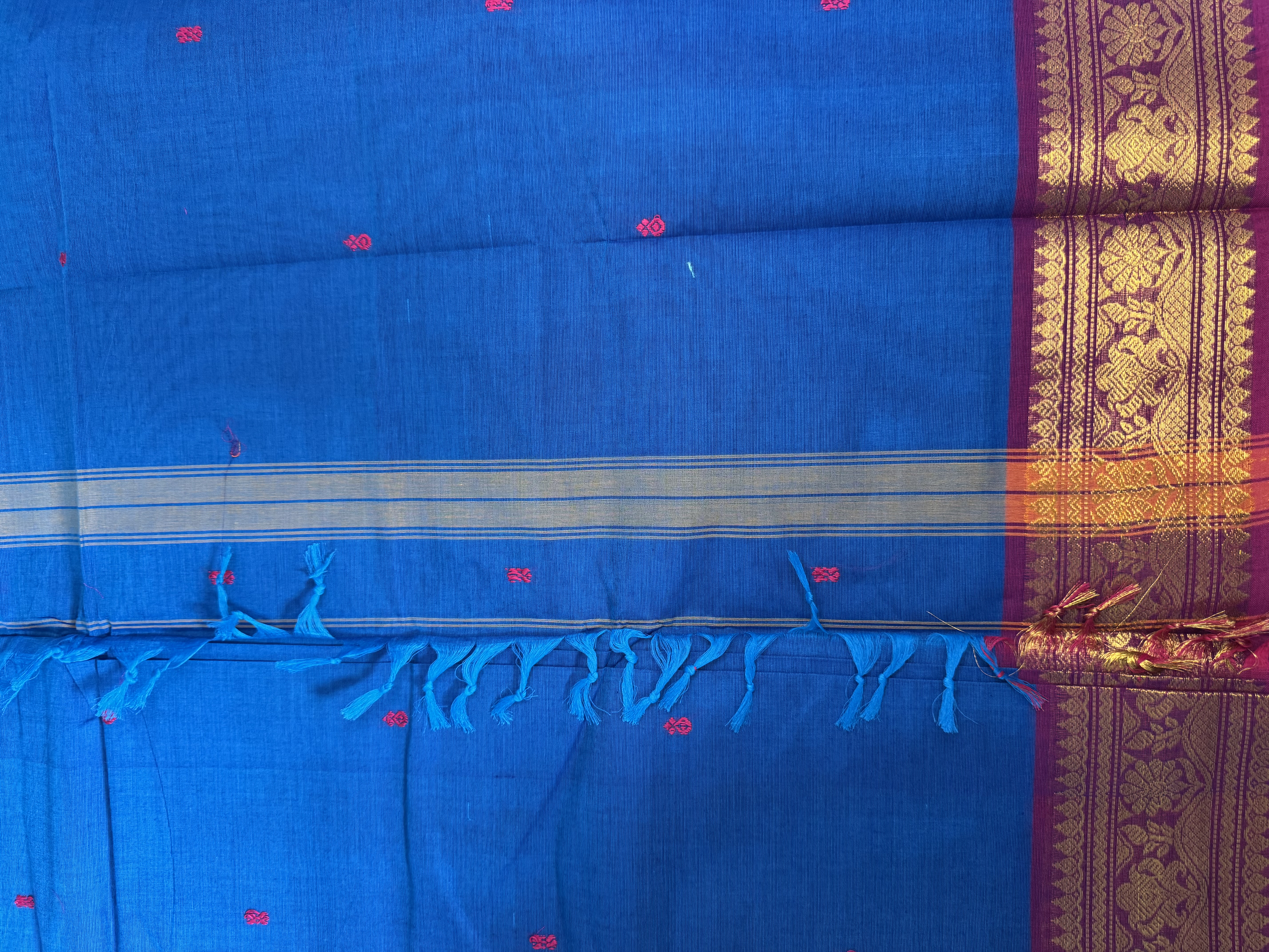 Bright blue cotton saree with pink border