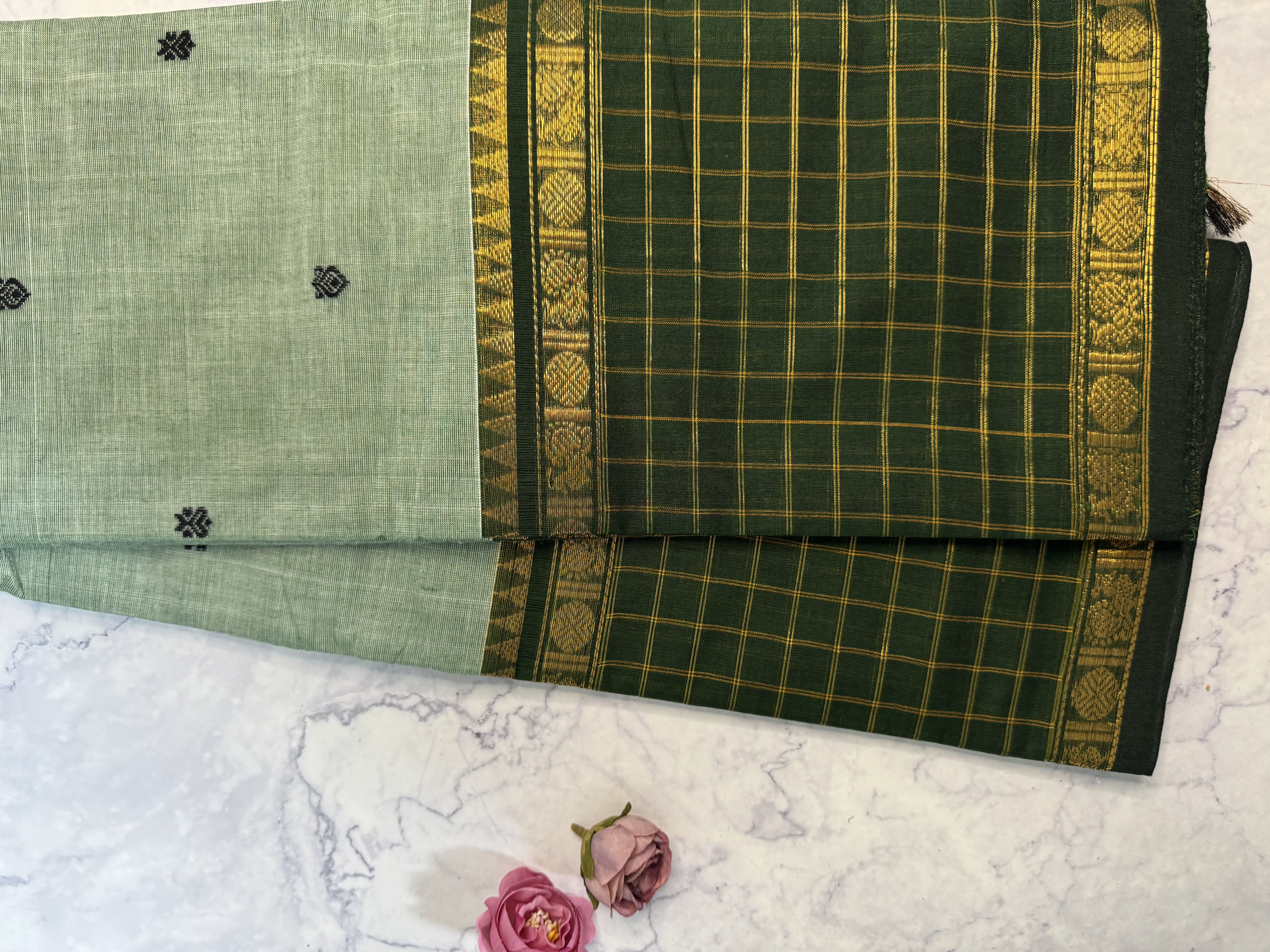 Sage green cotton saree with emerald border