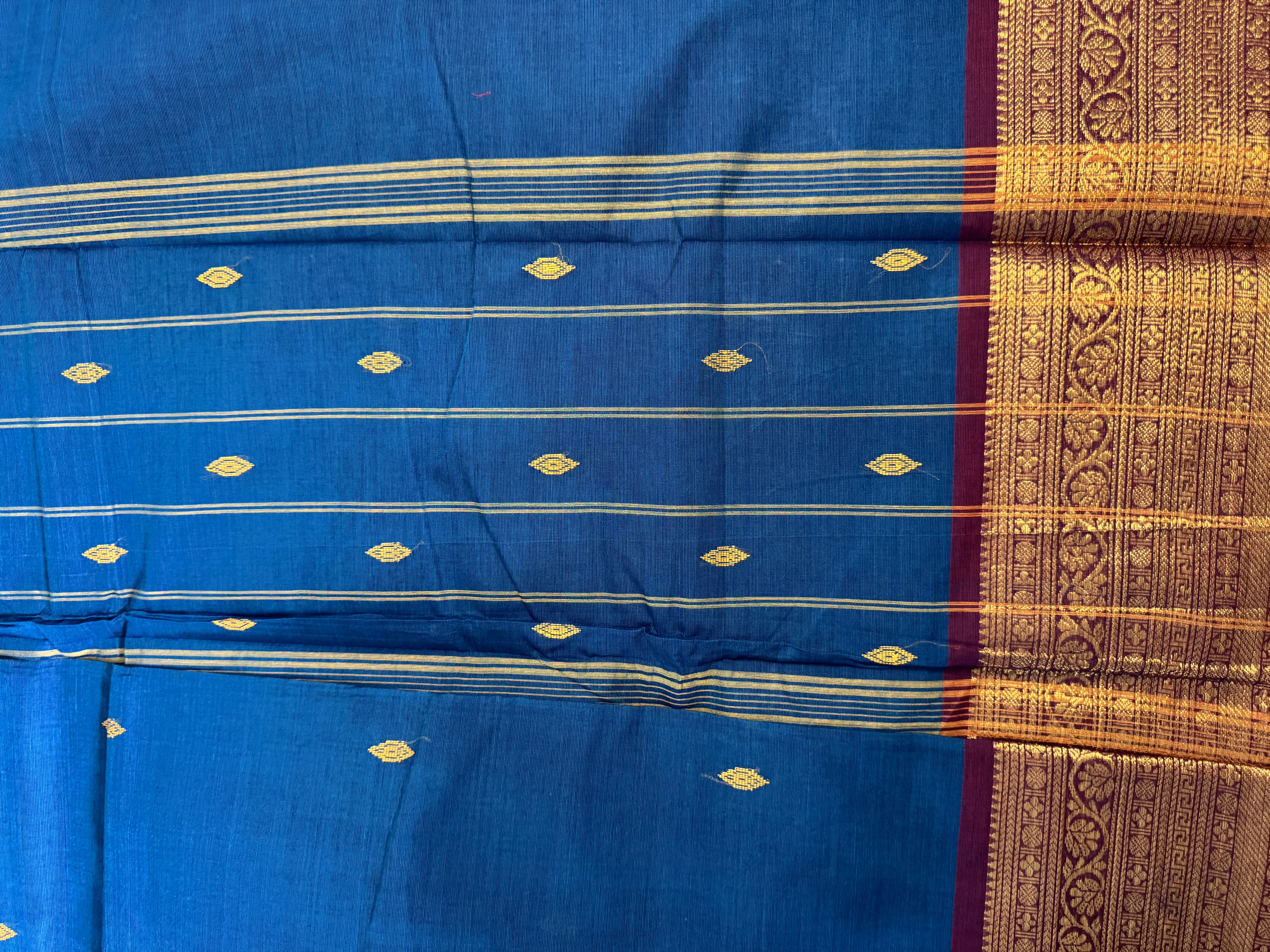 Teal cotton saree with red border