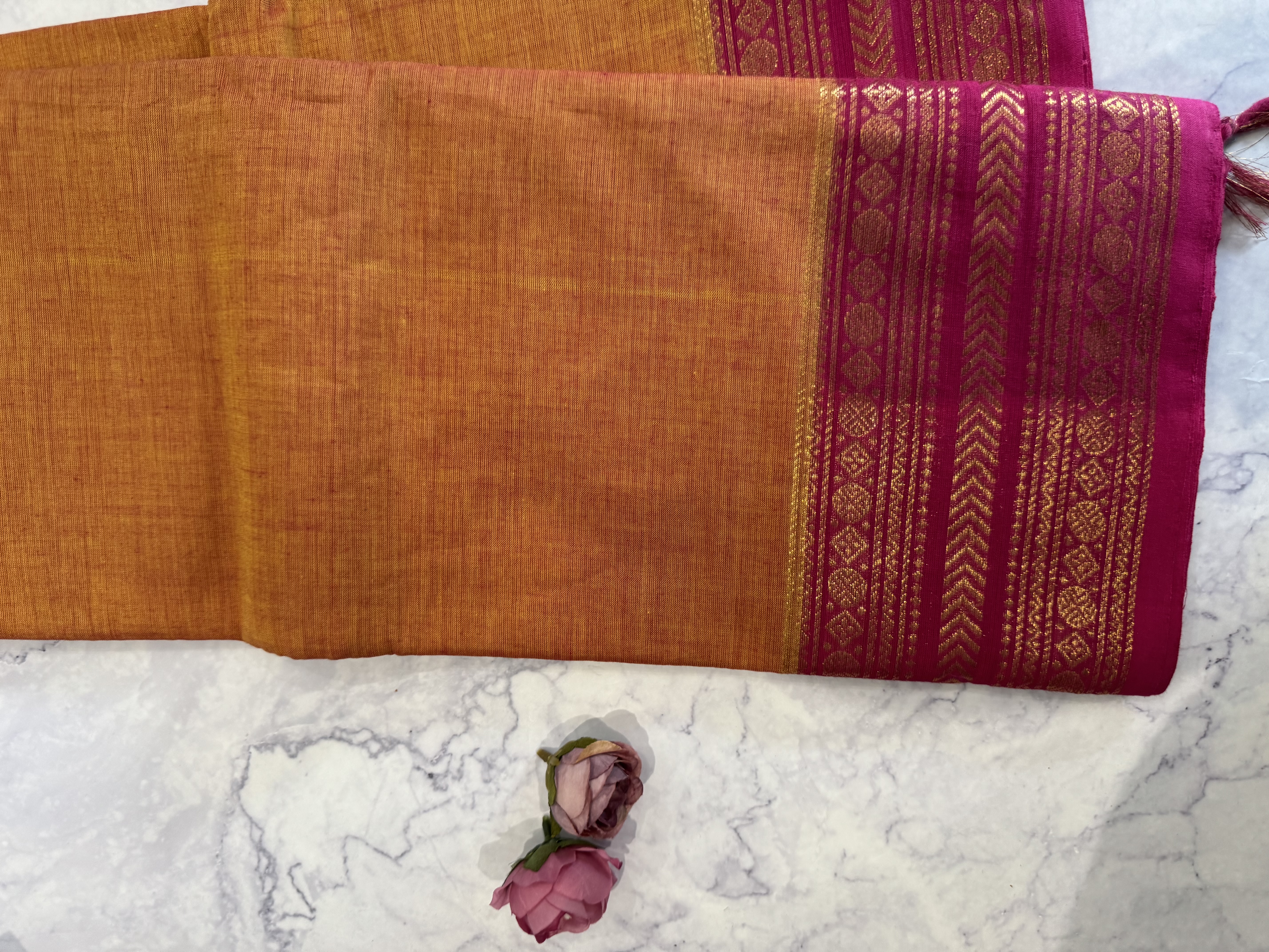 Orange cotton saree with pink border