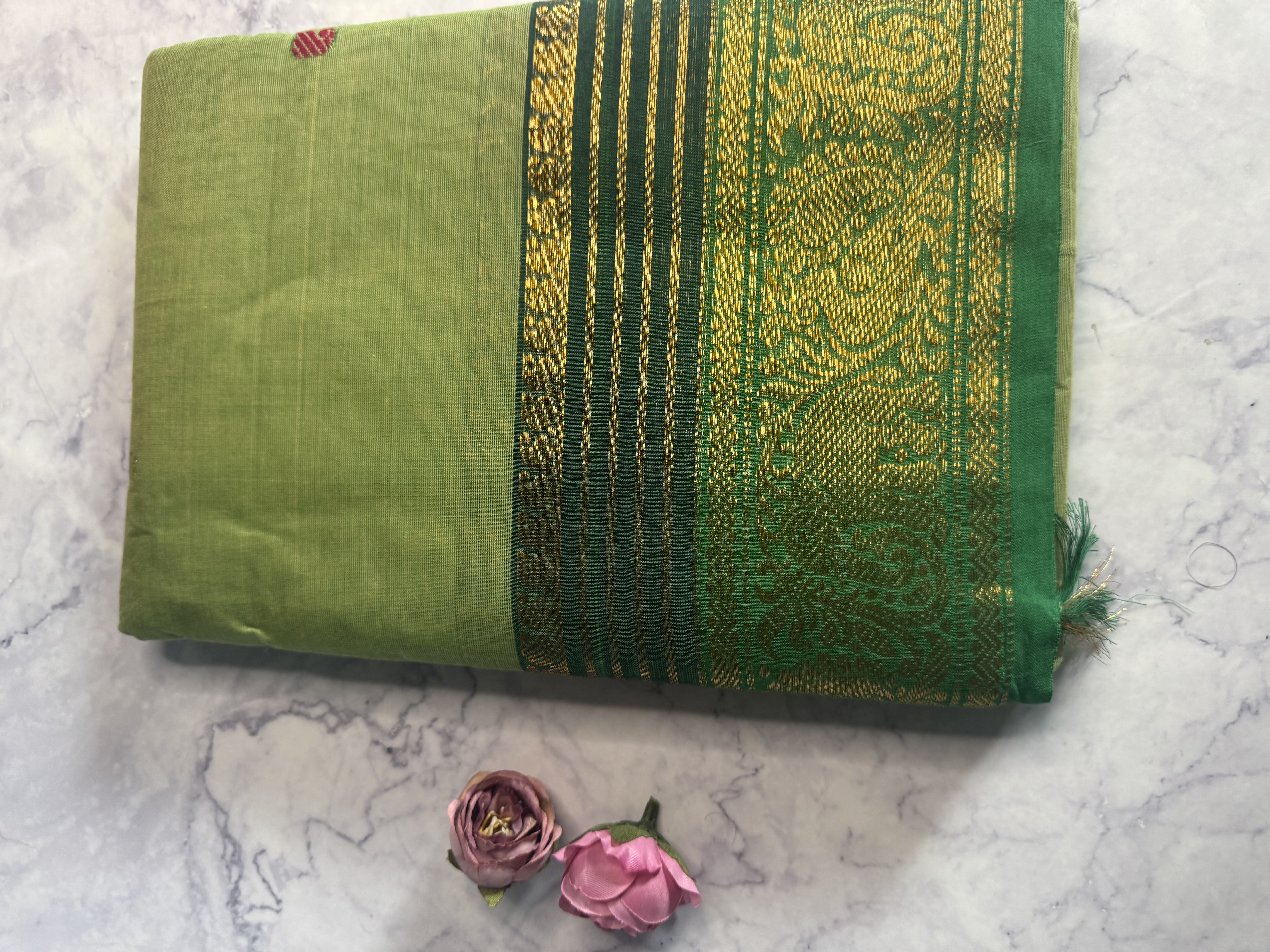 Grass green cotton saree with emerald border