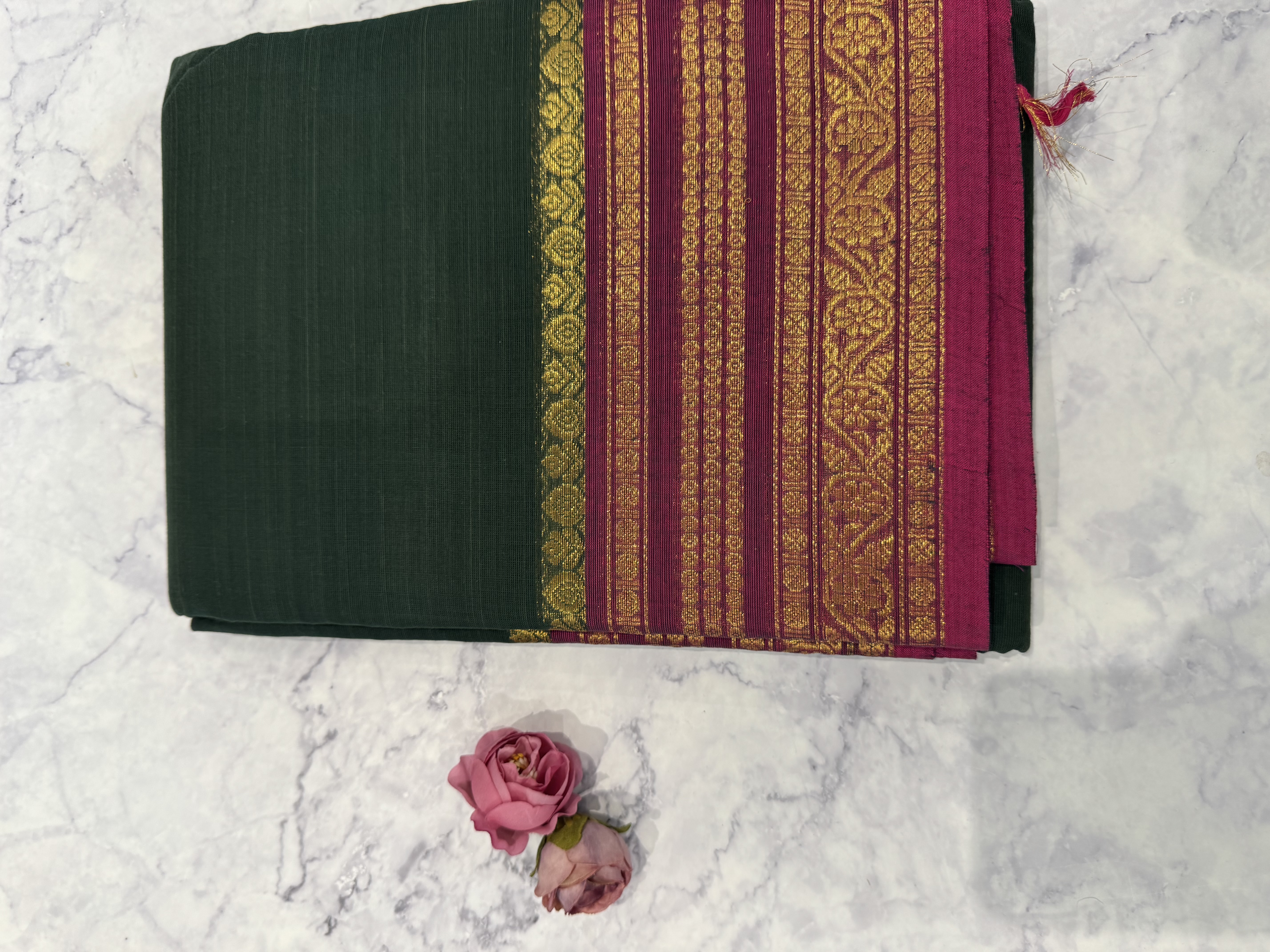 Forest green cotton saree with pink border