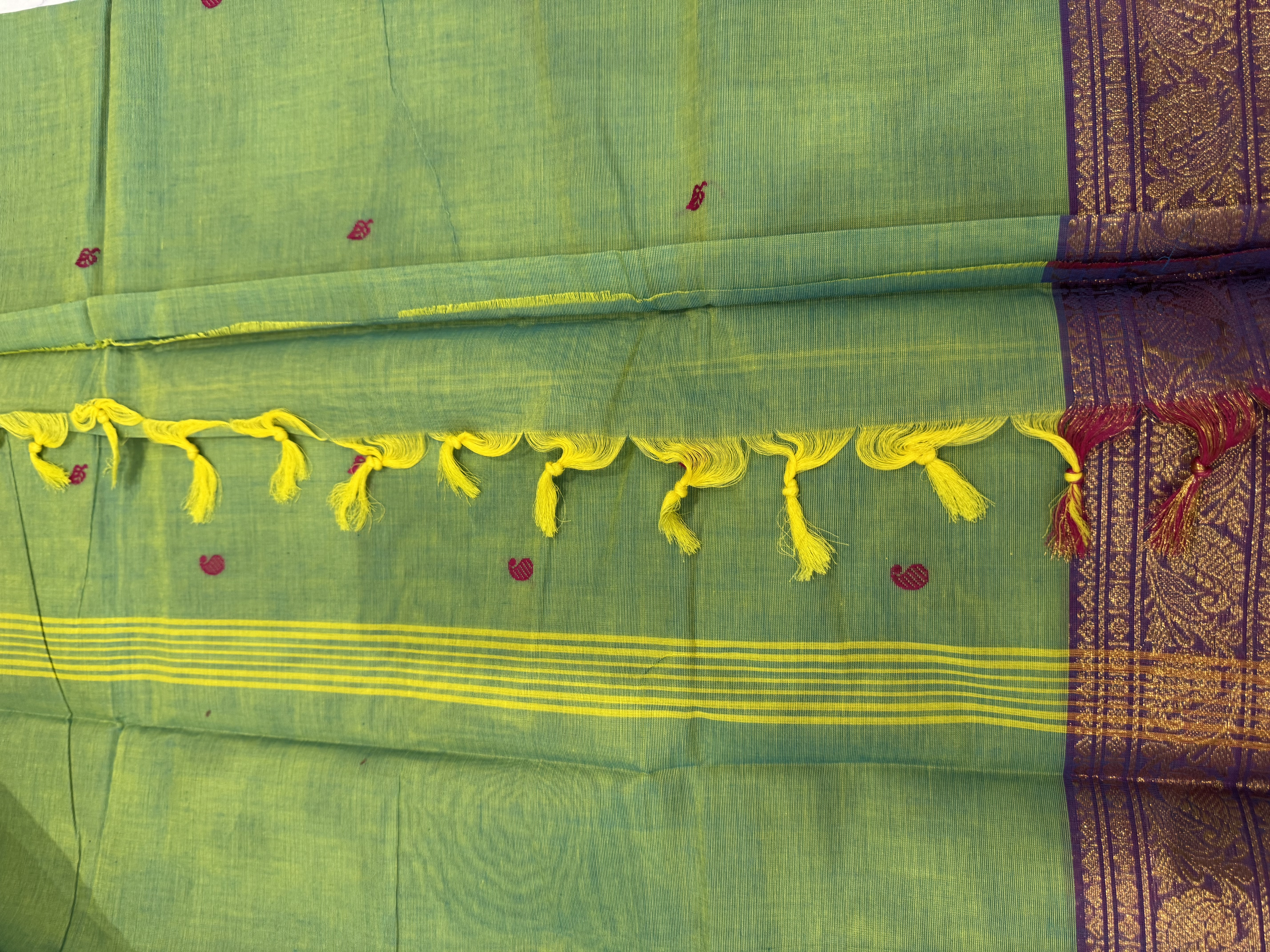 Pastel green cotton saree with pink border