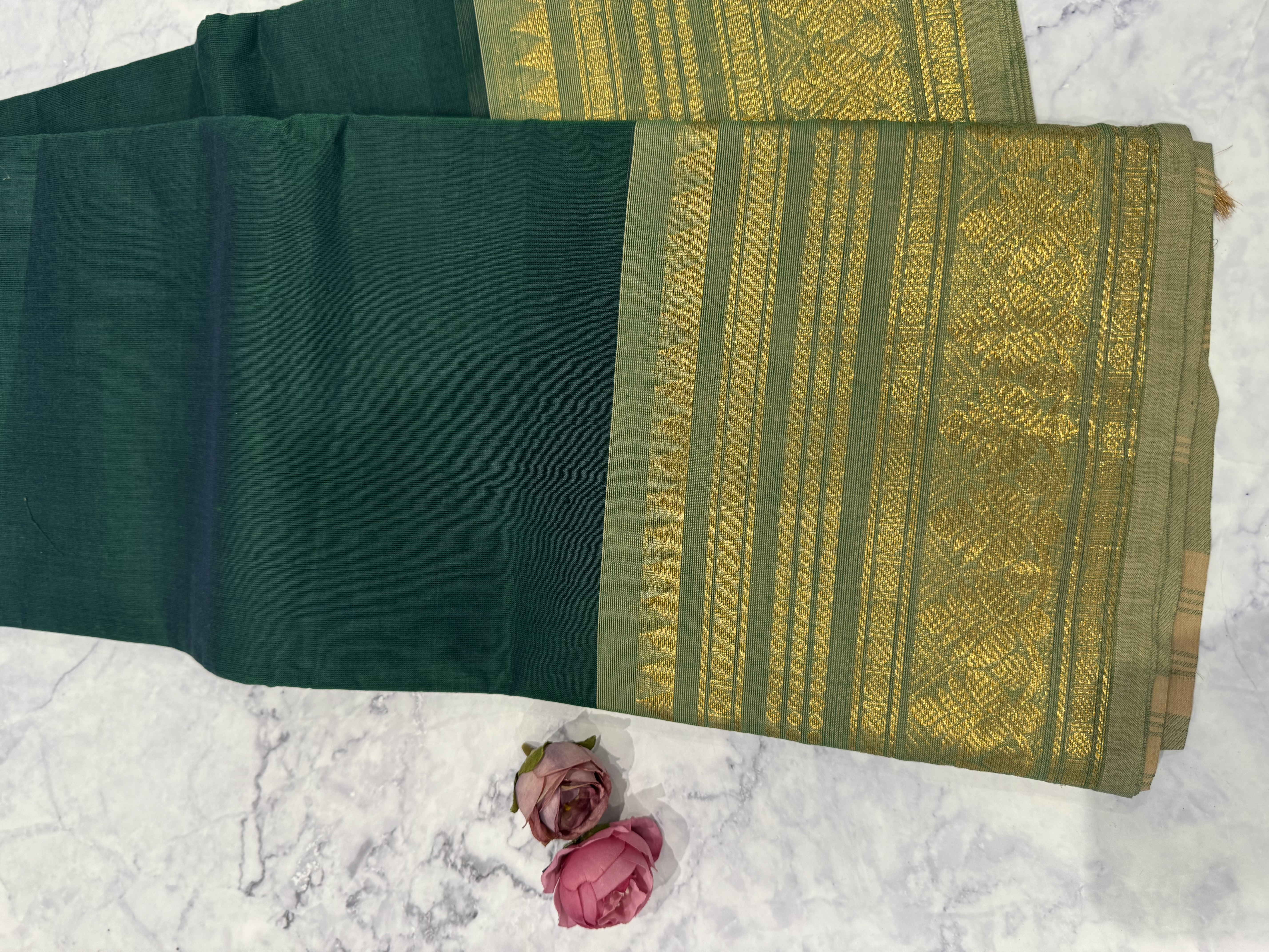 Dark green cotton saree with sage green border