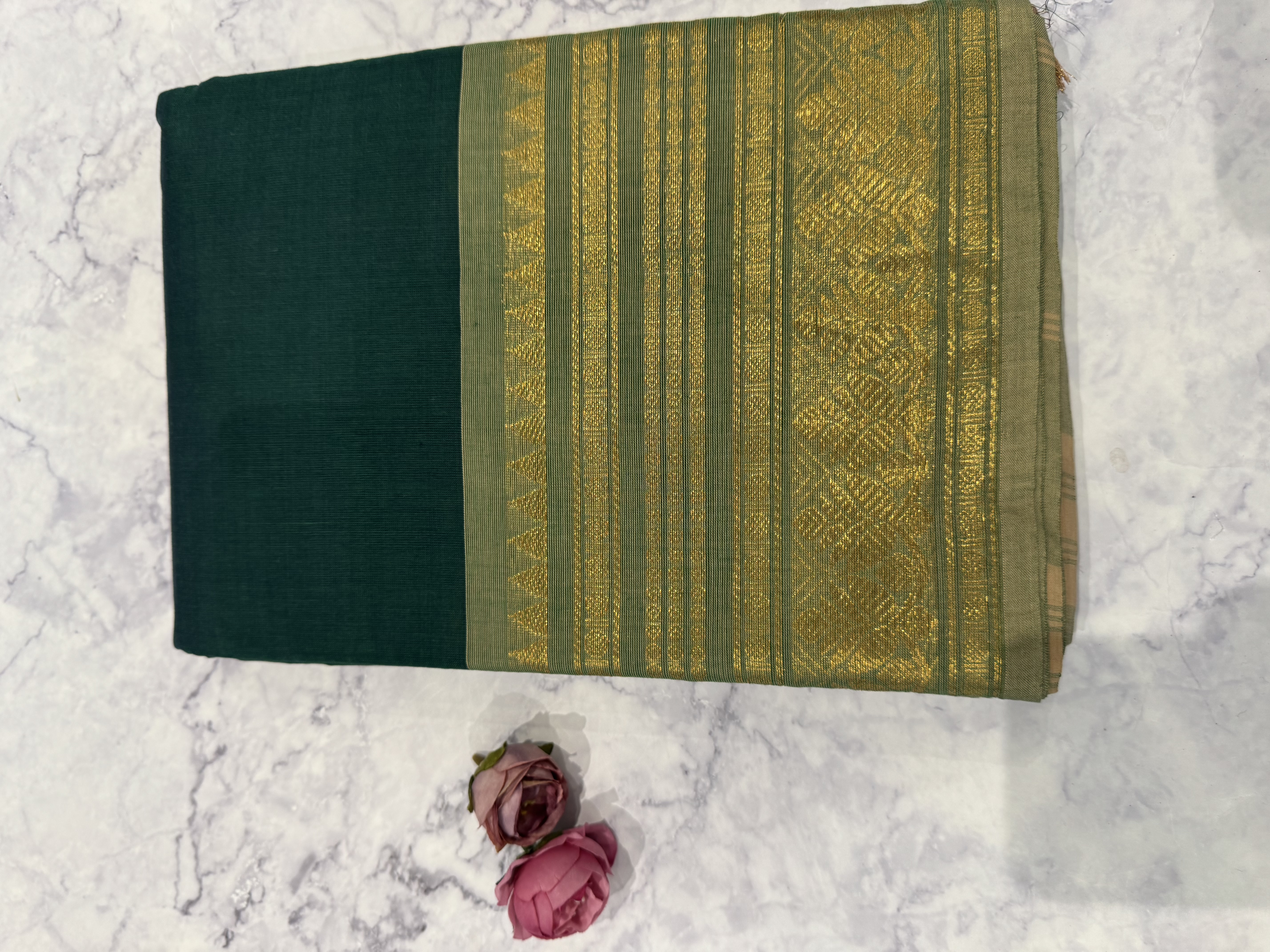 Dark green cotton saree with sage green border