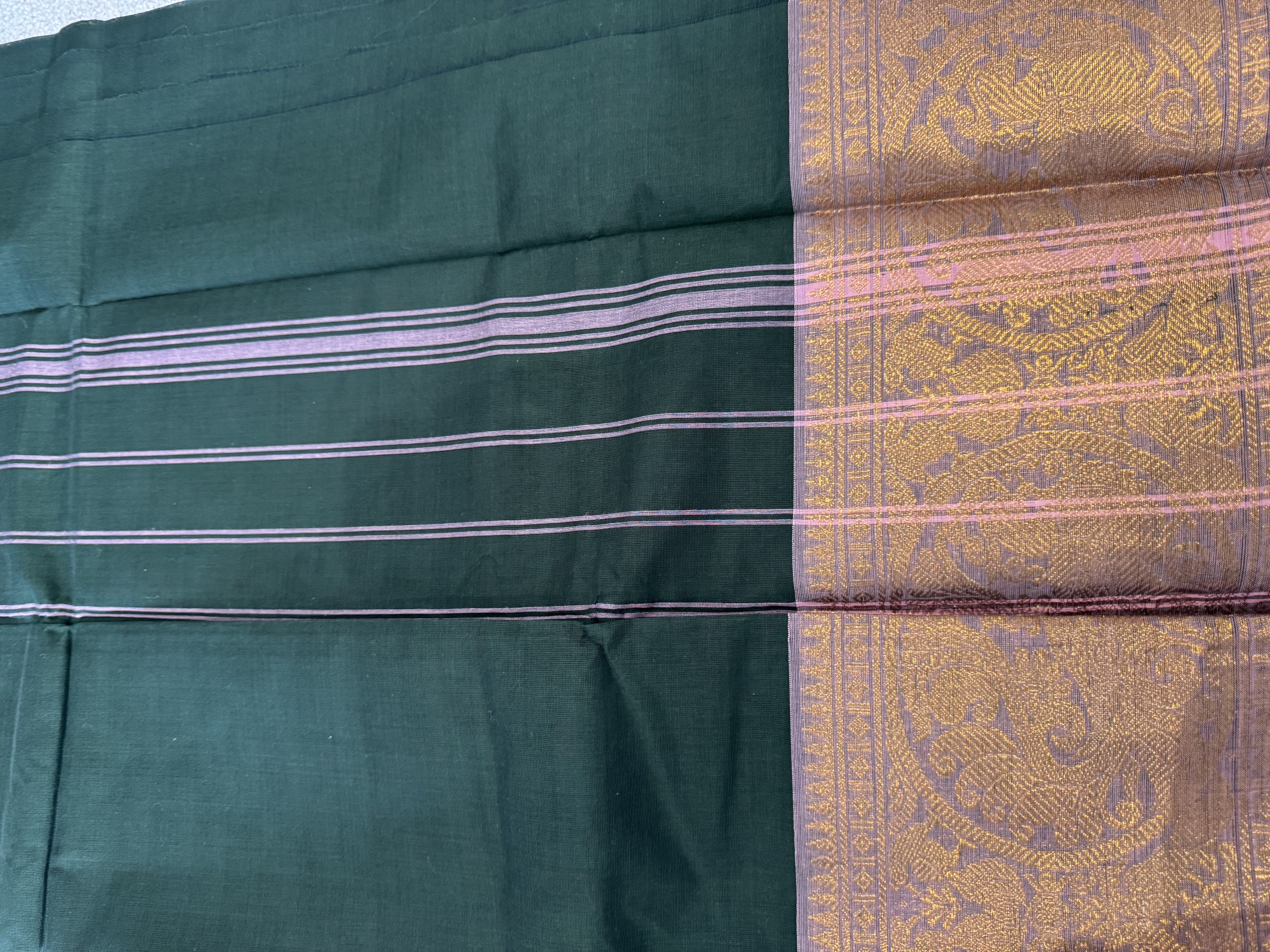 Forest green cotton saree with pink border without blouse