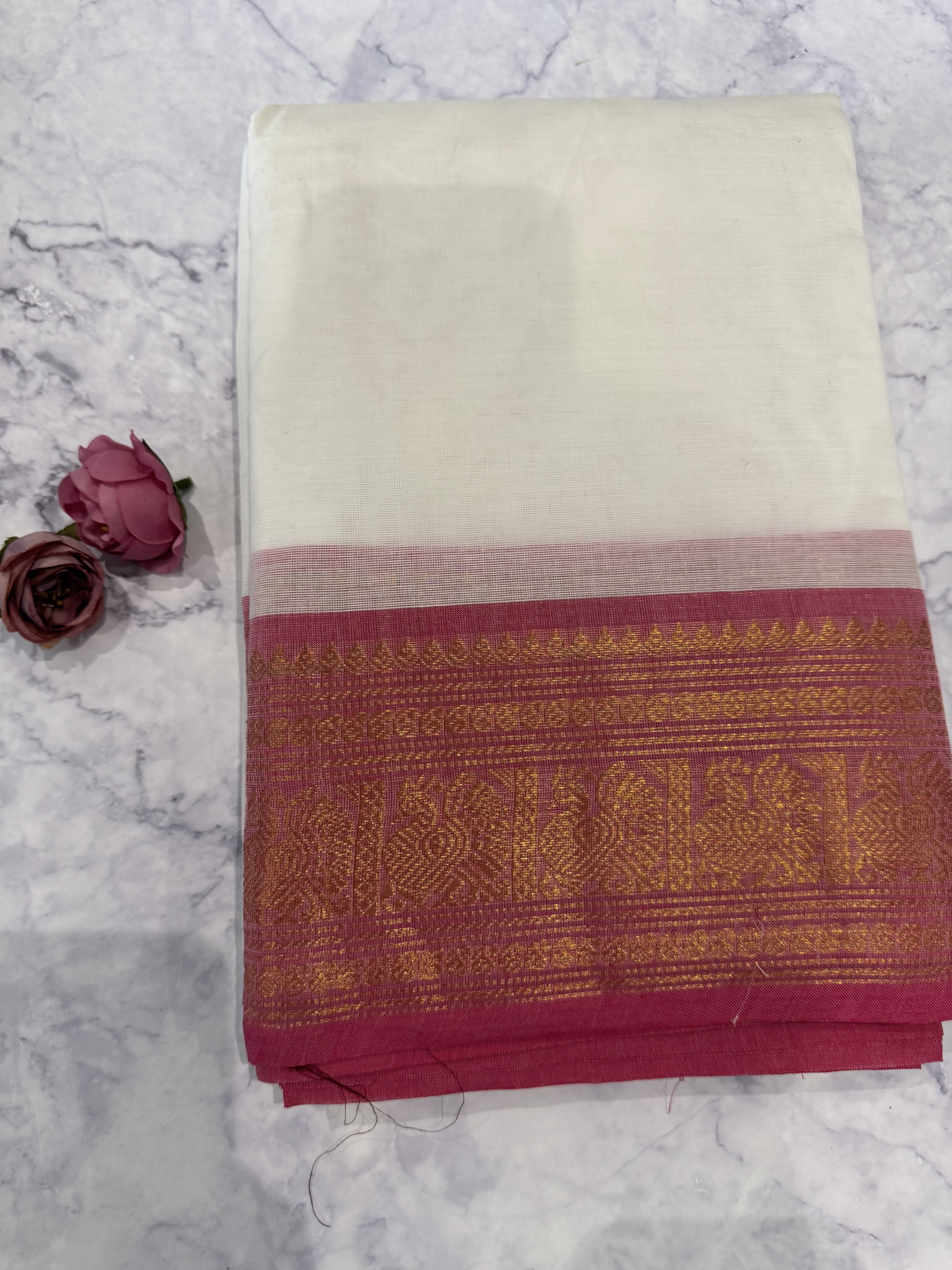 White cotton saree with pink border