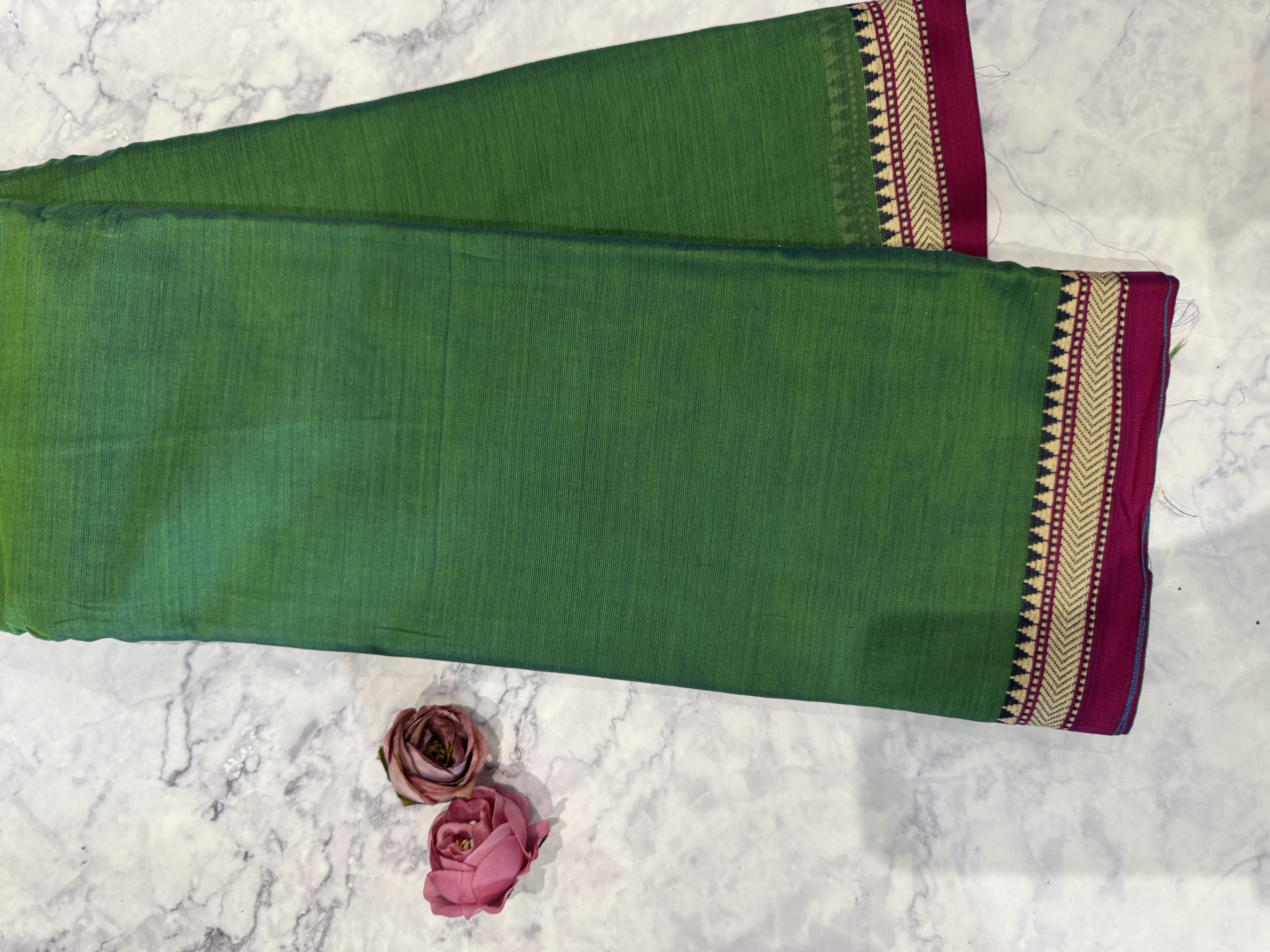Electric green cotton saree with thin red border
