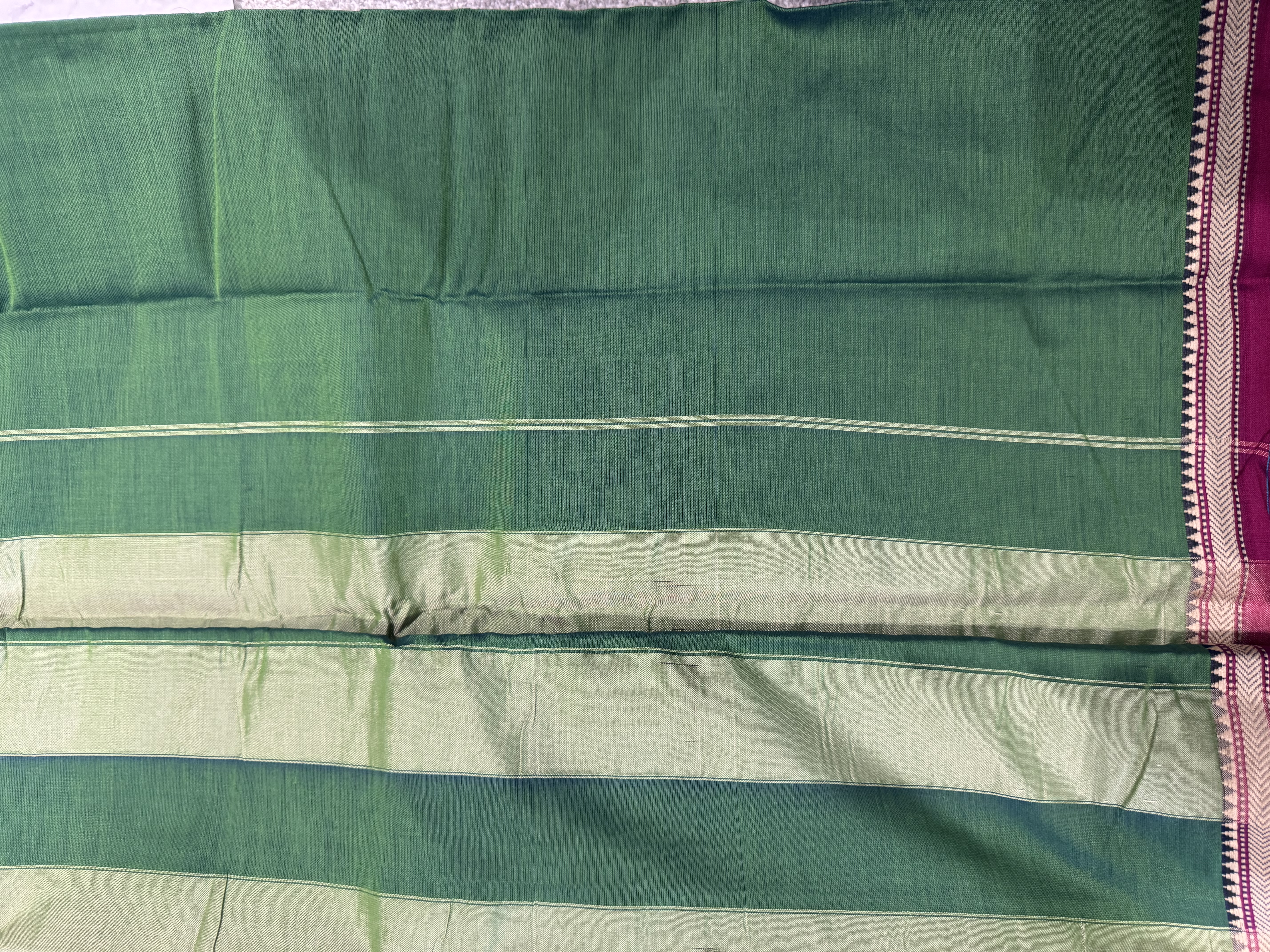 Electric green cotton saree with thin red border