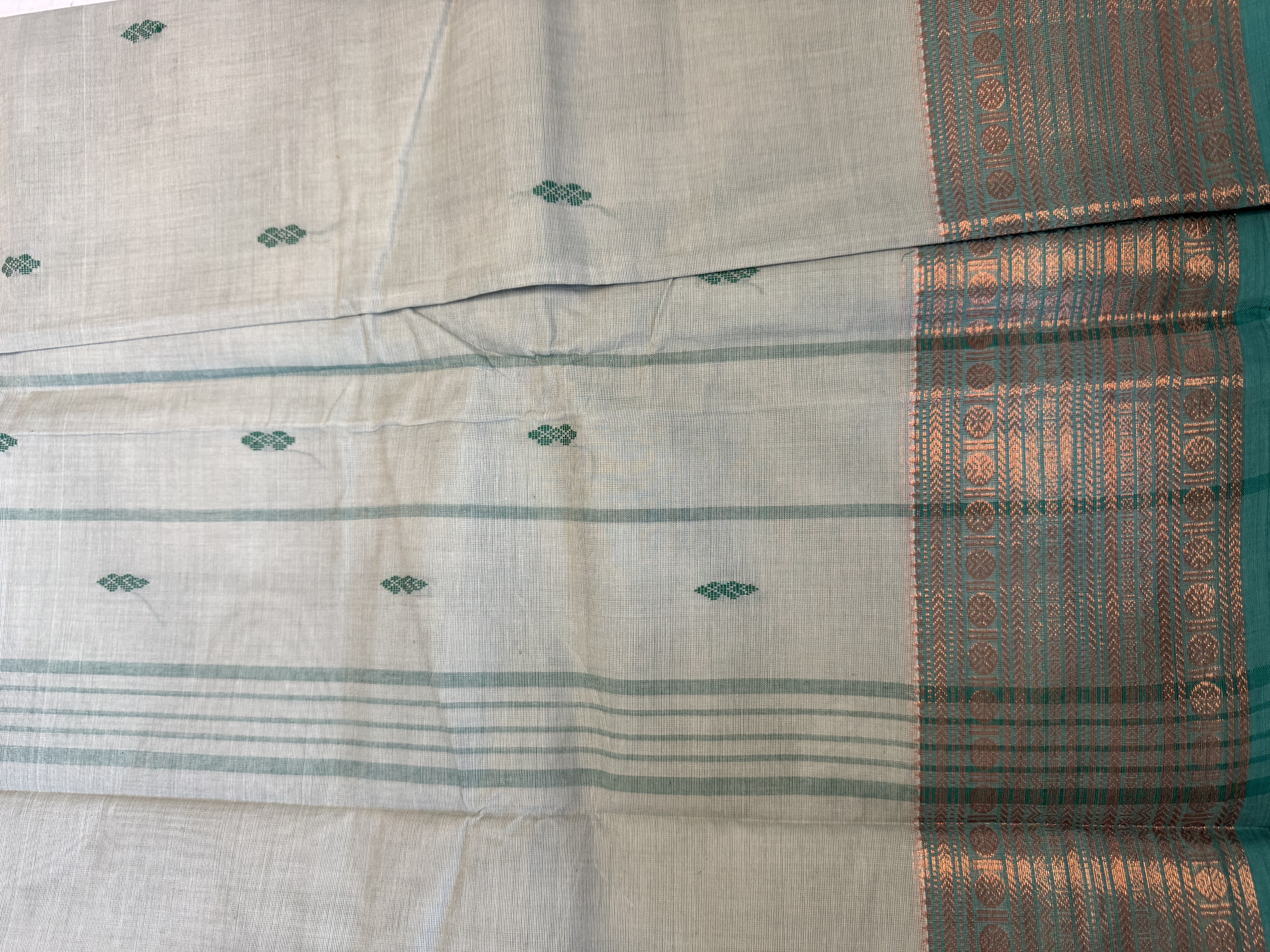 Mint blue cotton saree with teal border