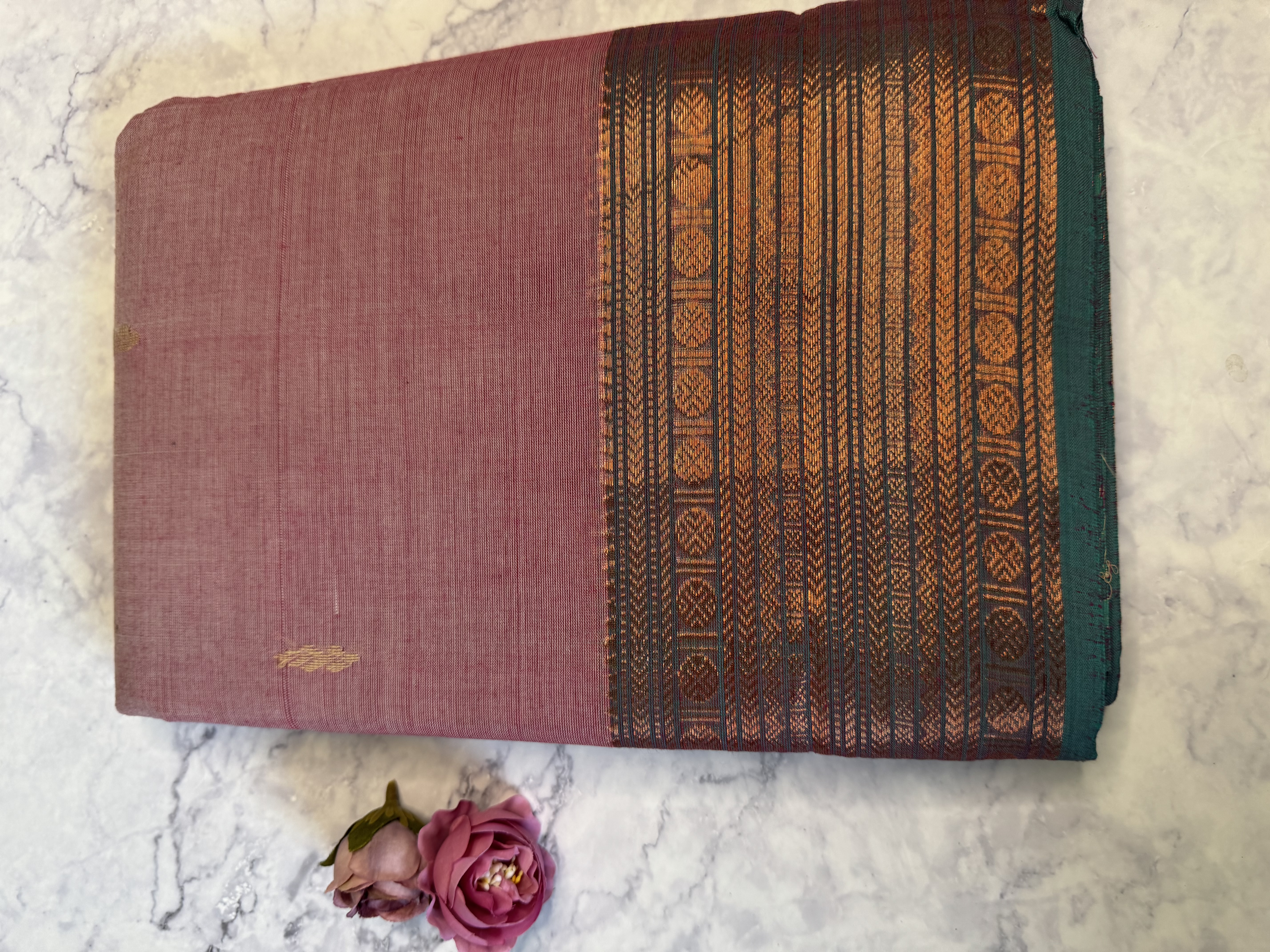 Pastel pink cotton saree with teal blouse