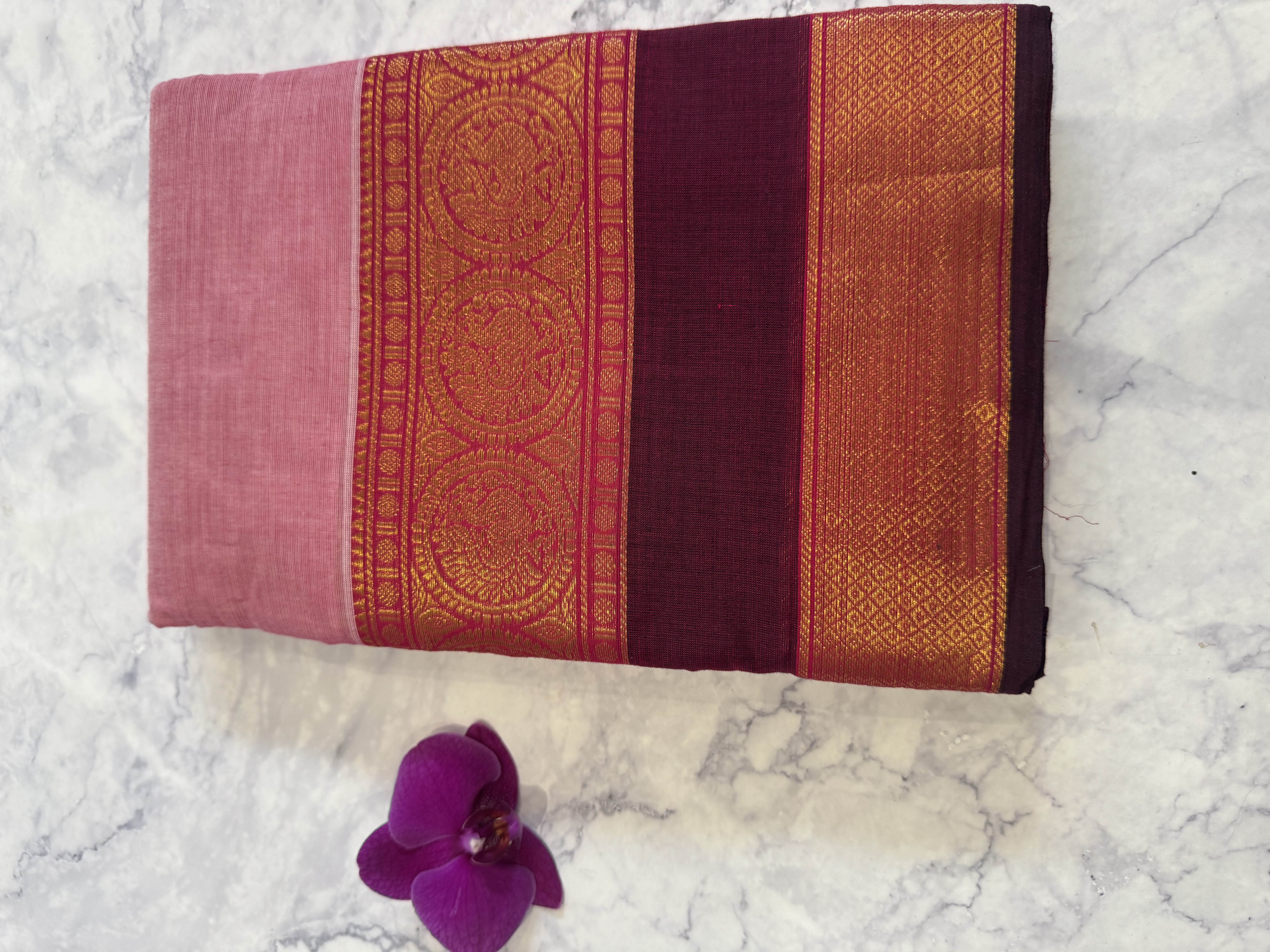 Pastel pink cotton saree with plum border