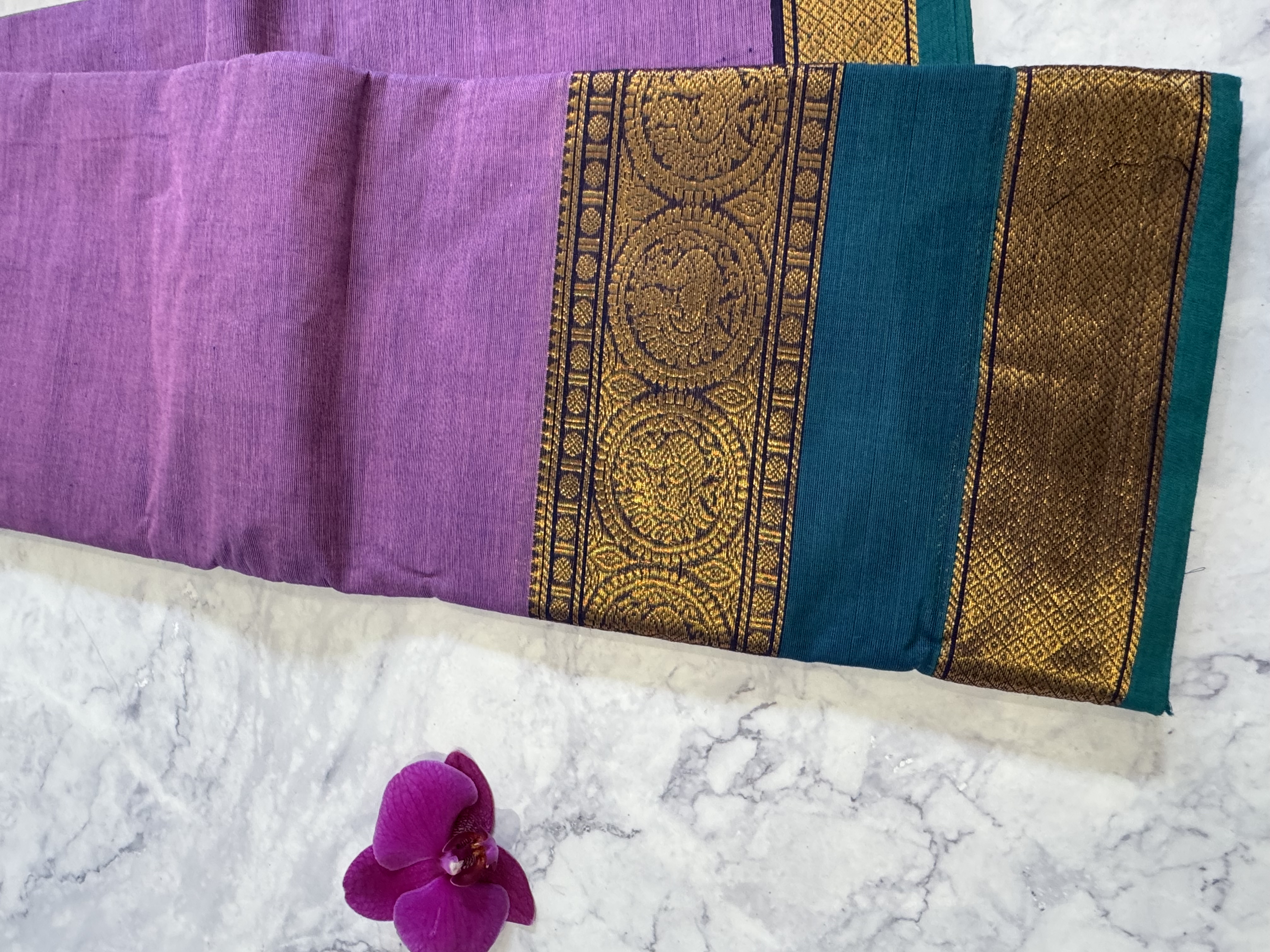 Lavender cotton saree with teal border