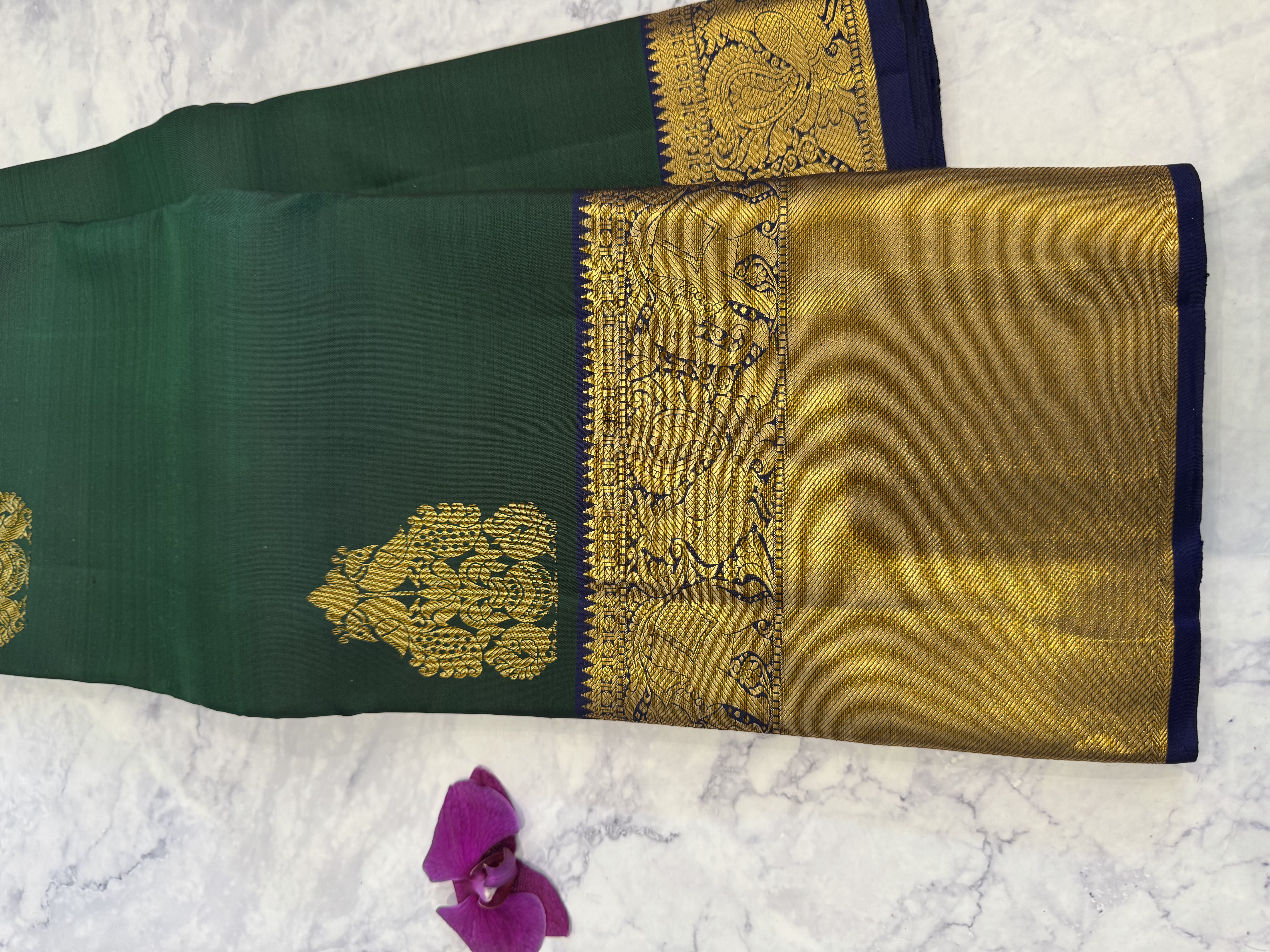 Forest green pure silk saree with navy blue blouse