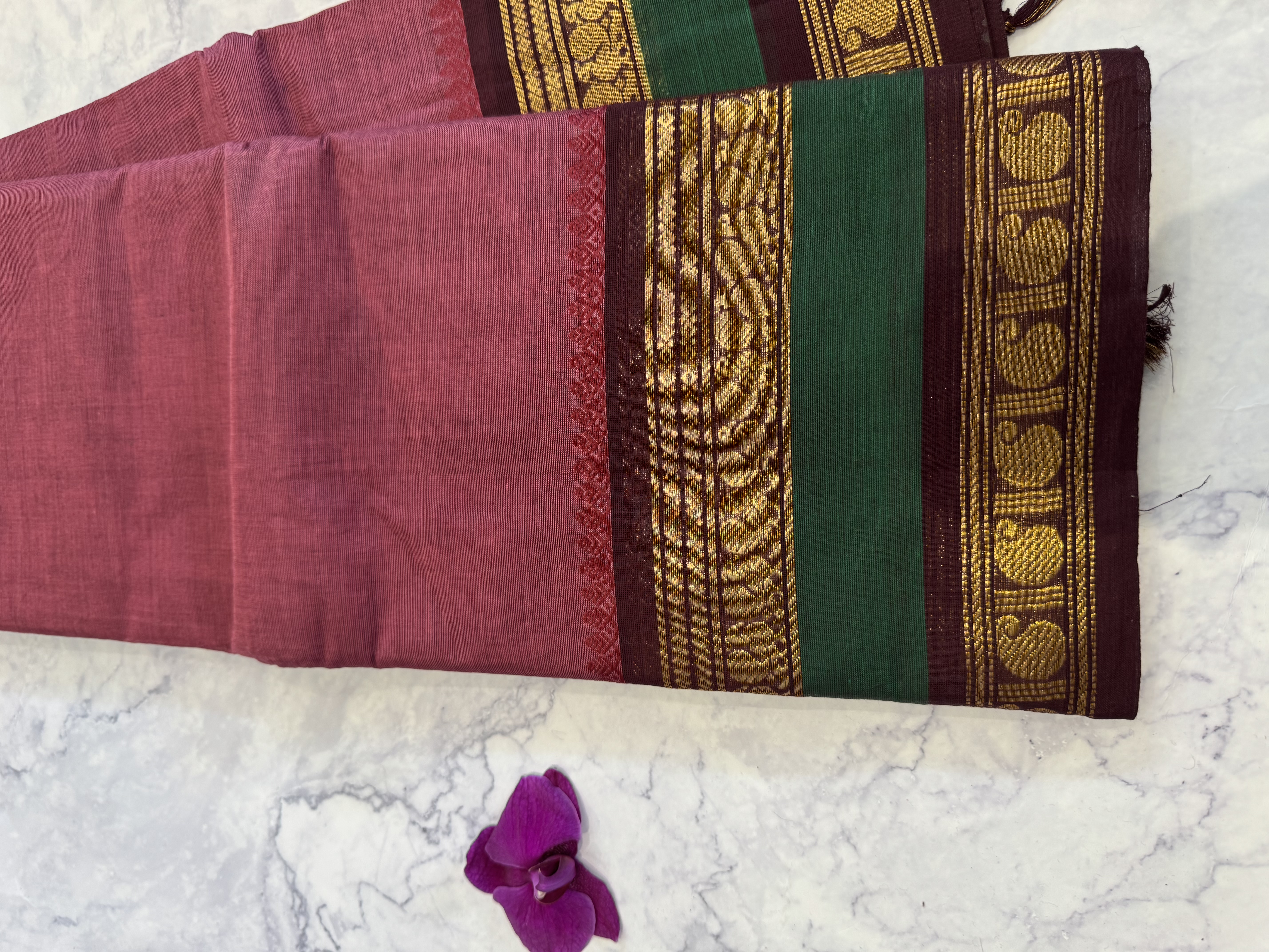Blush pink cotton saree with green border