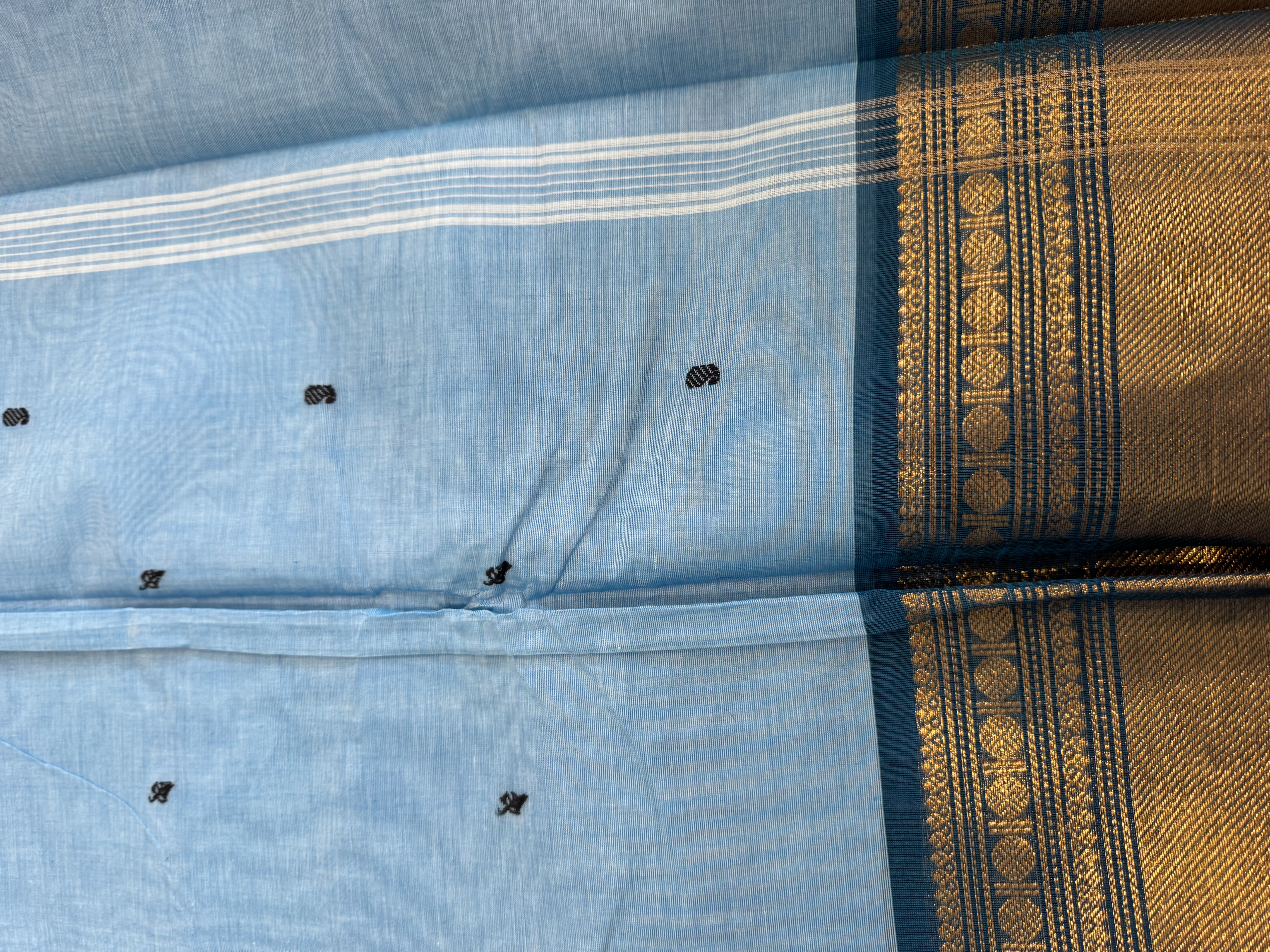 Baby blue cotton saree with teal border