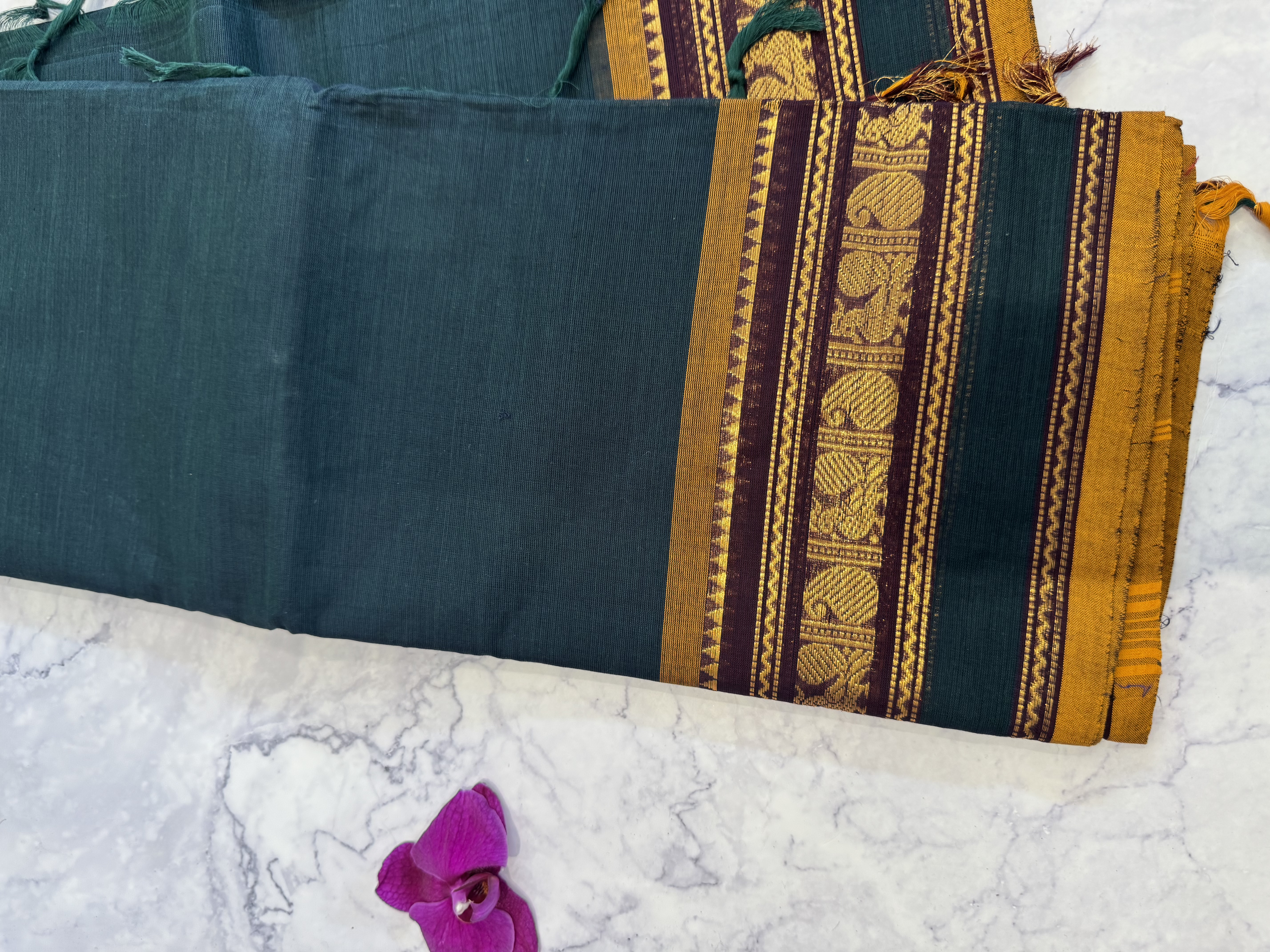 Teal cotton saree with brown border