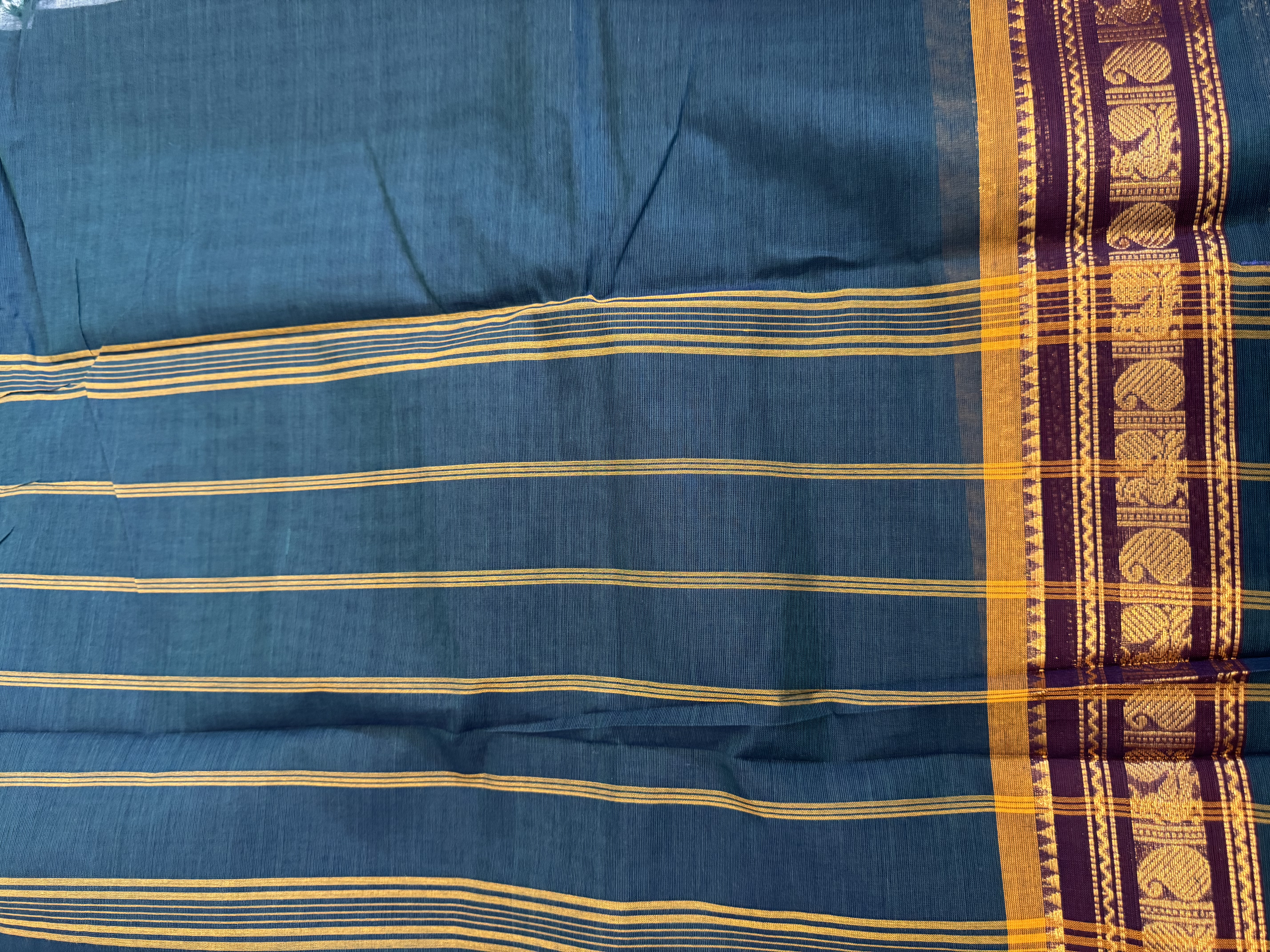 Teal cotton saree with brown border