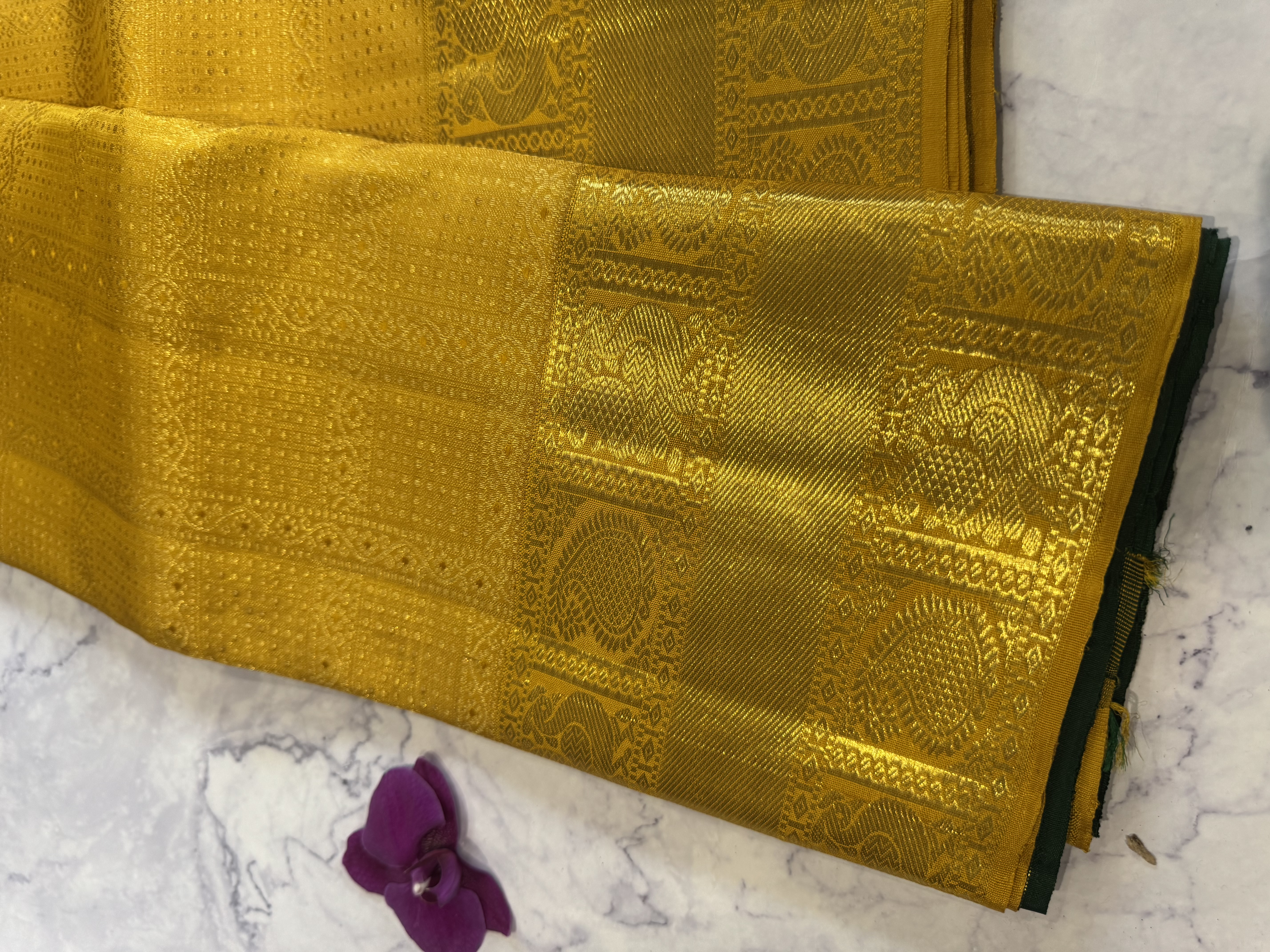 Yellow pure silk saree with forest green blouse