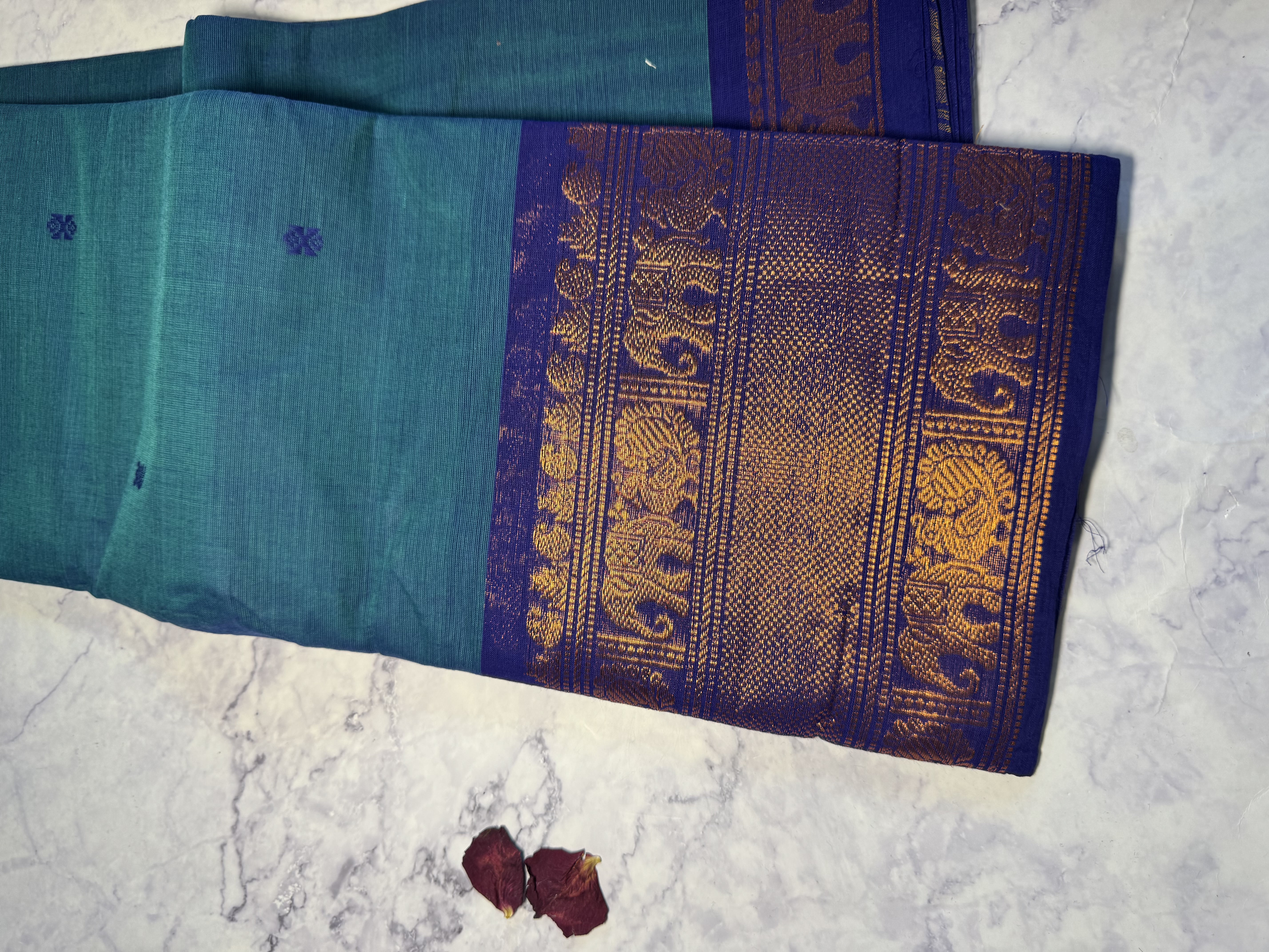 Teal cotton saree with navy border and copper zari