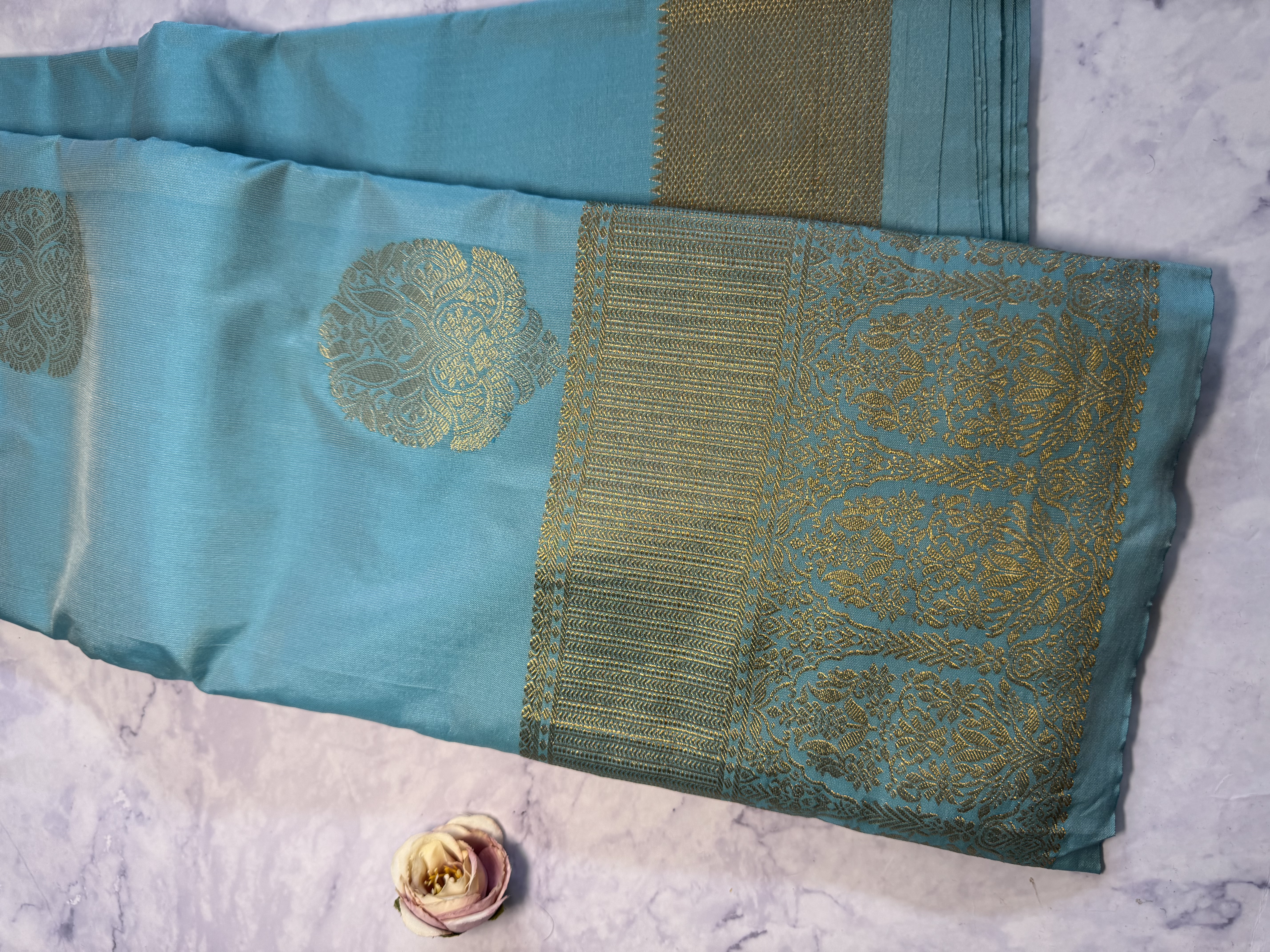 Baby blue semi silk saree with gold zari