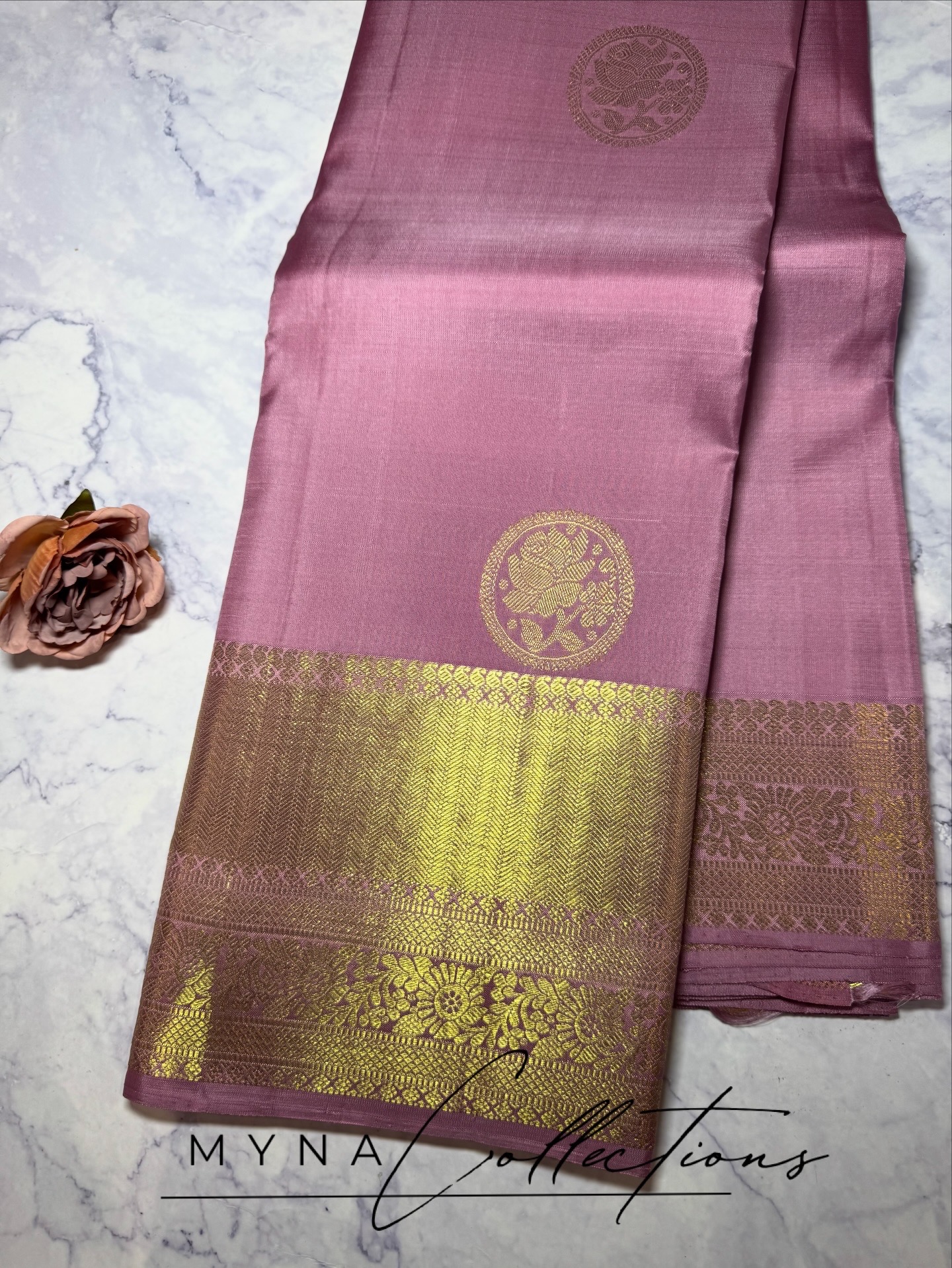 Blush pink pure silk kanchipuram with gold zari rose buttas