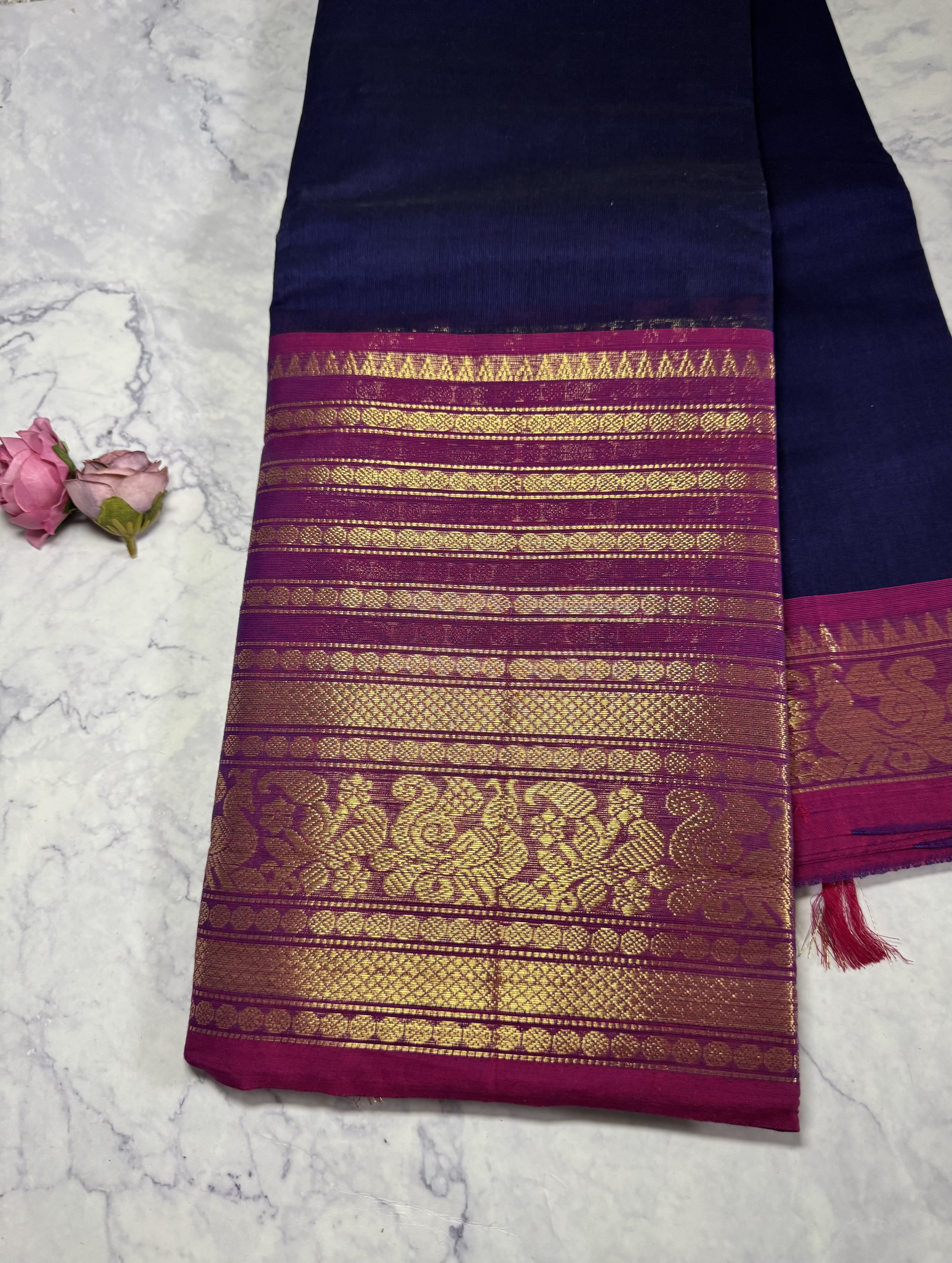 Navy blue cotton saree with pink border