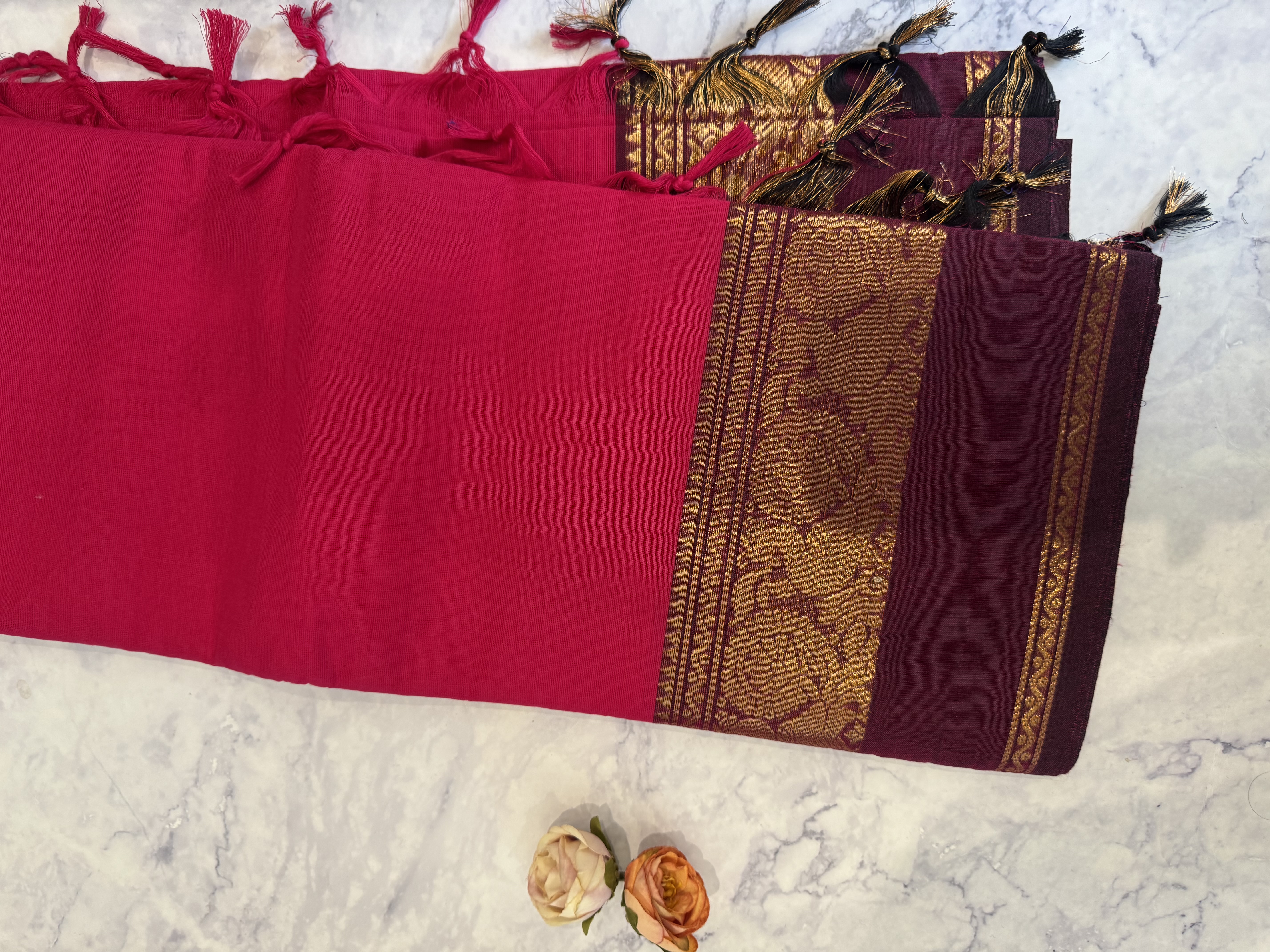 Hot pink cotton saree with plum gap border