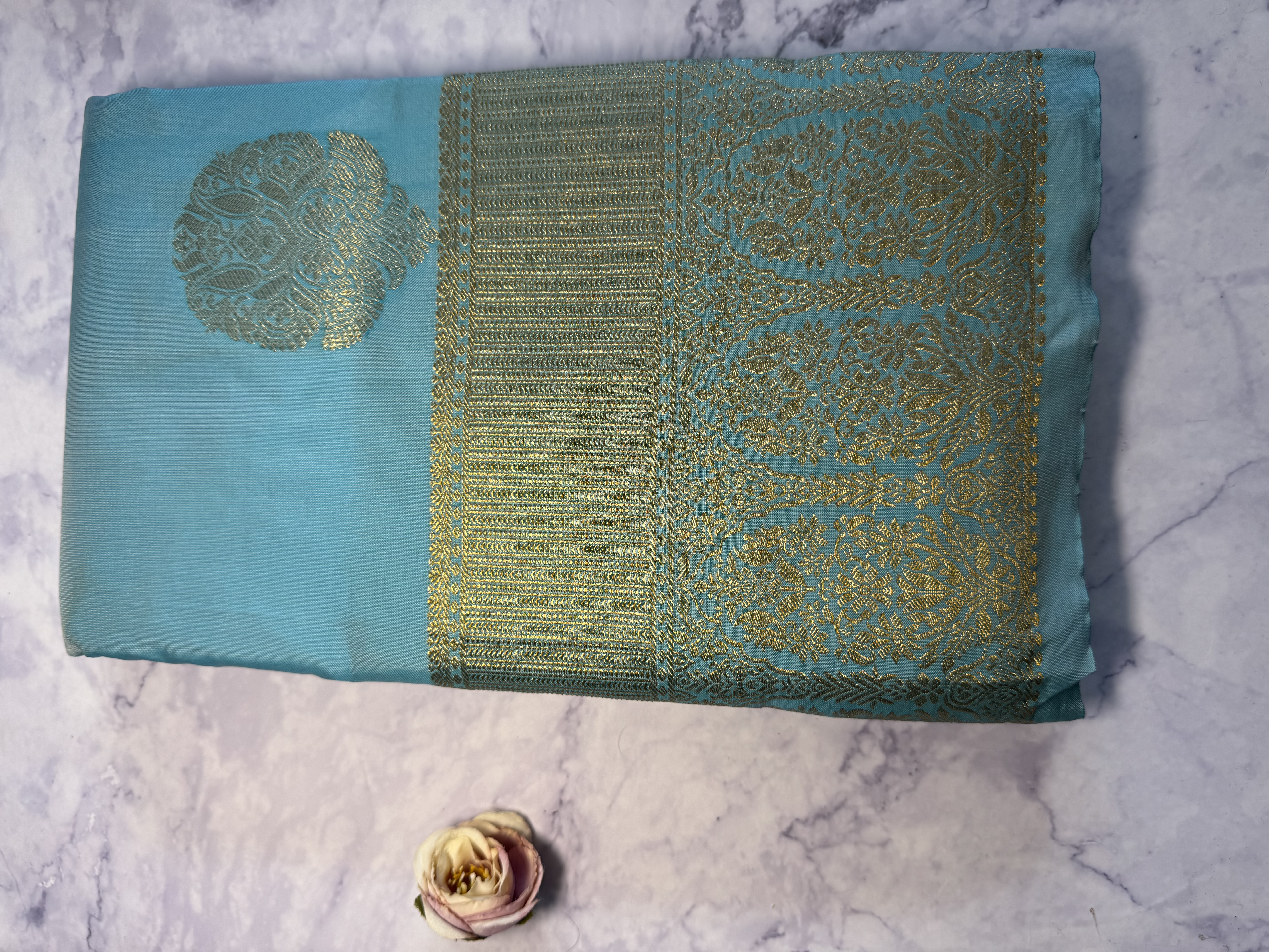 Baby blue semi silk saree with gold zari