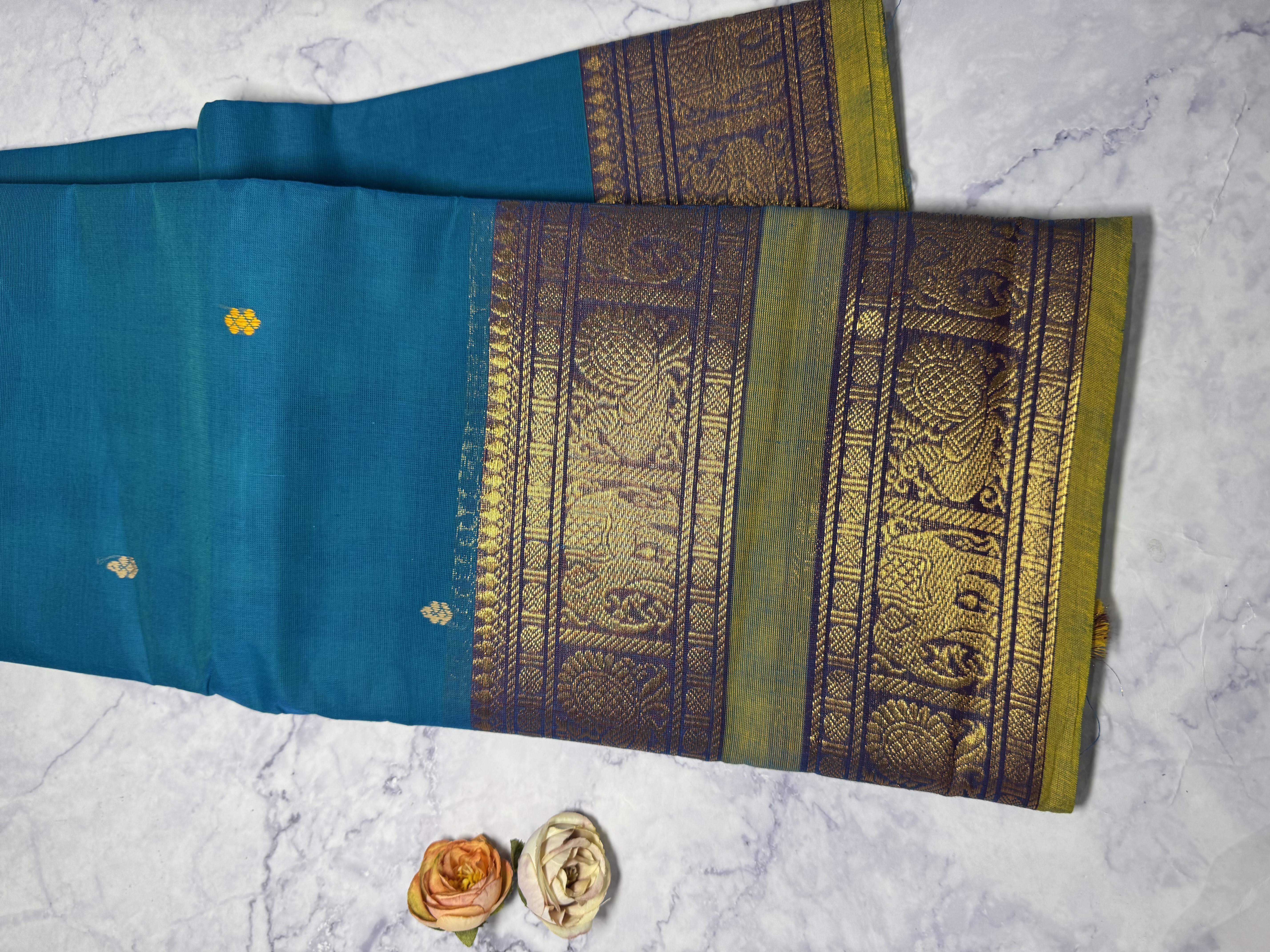 Sky blue cotton saree with lime green border