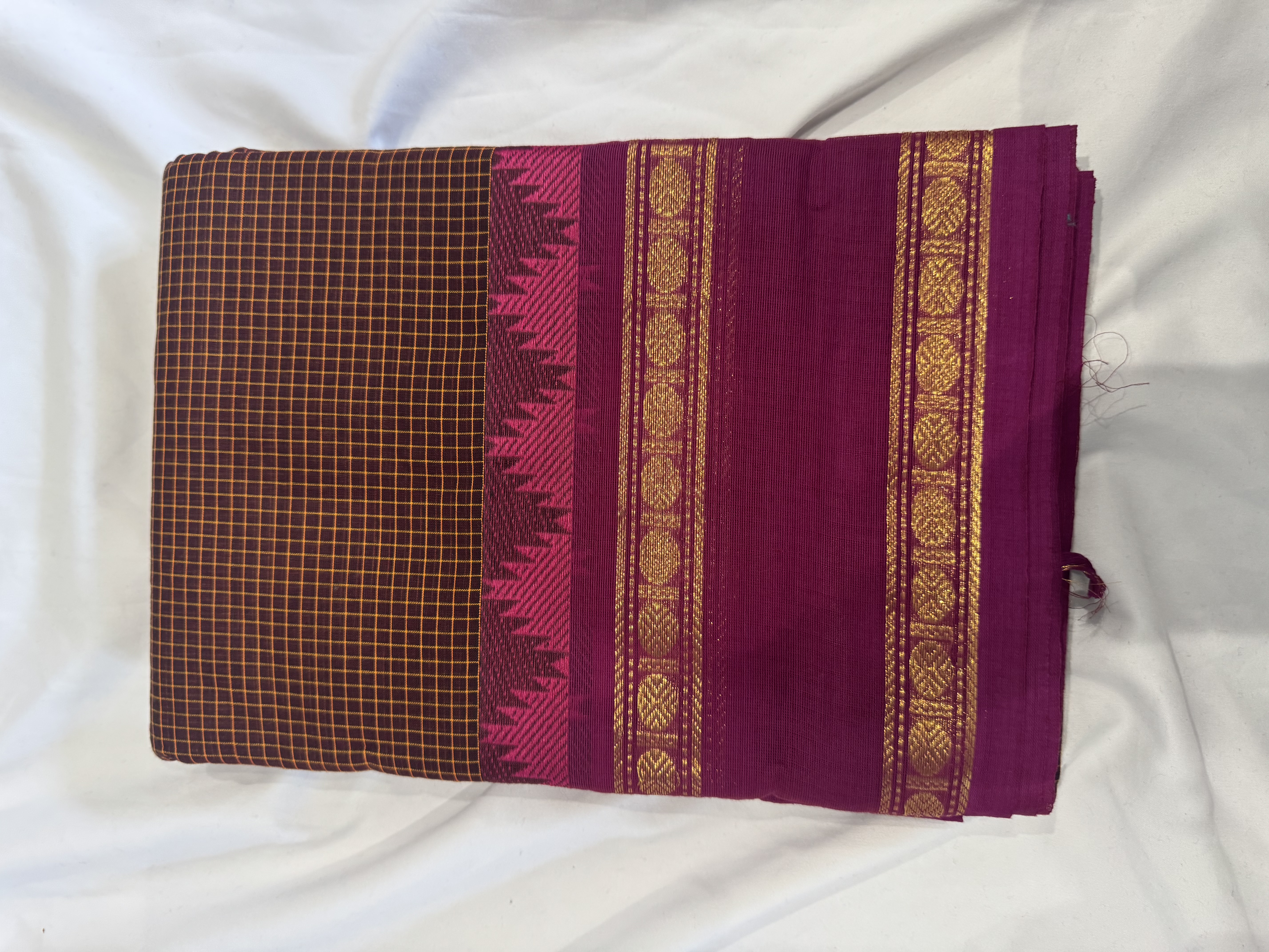 Brown vaira oosi saree with pink border