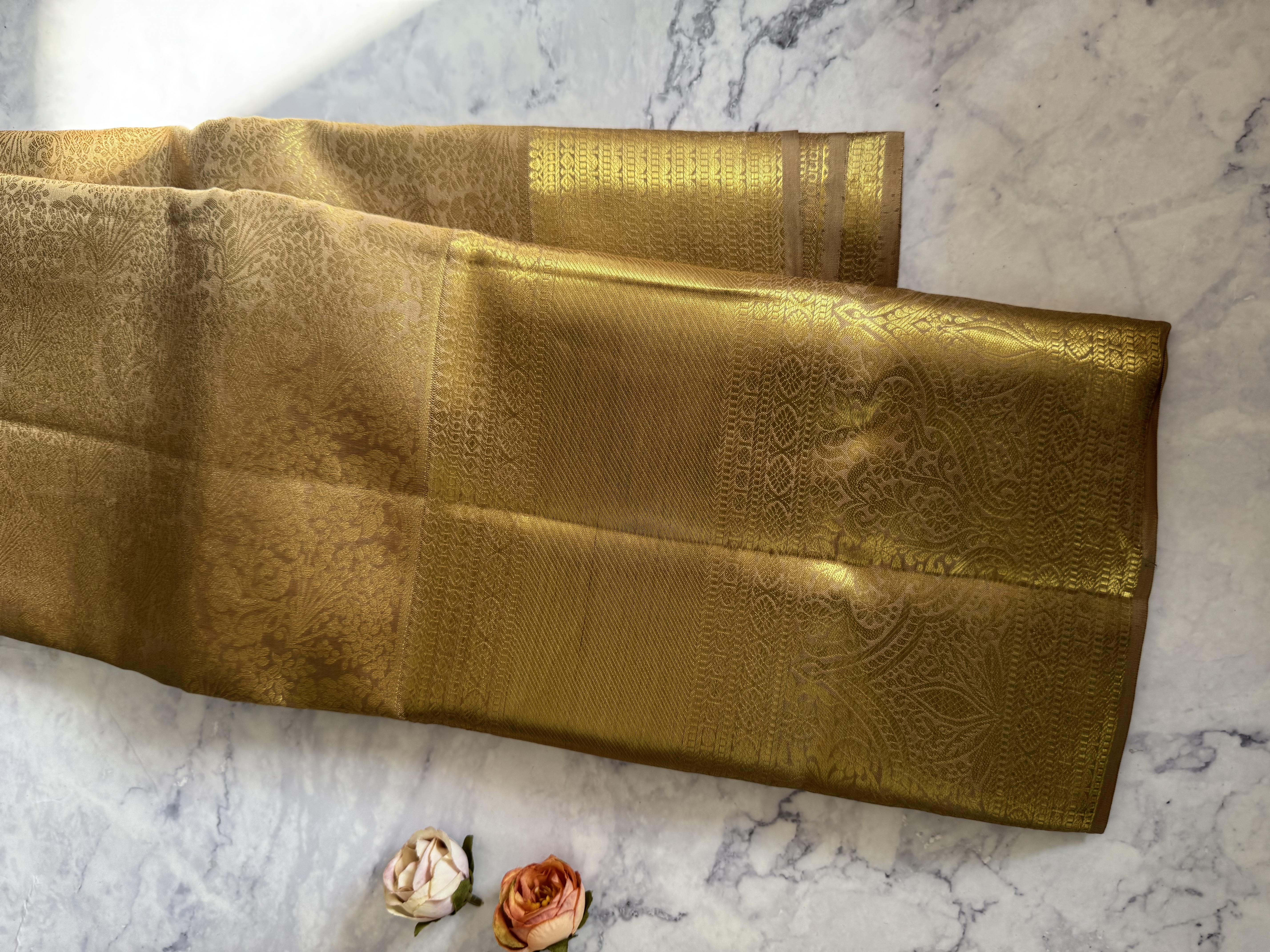 Beige pure silk saree with heavy gold work