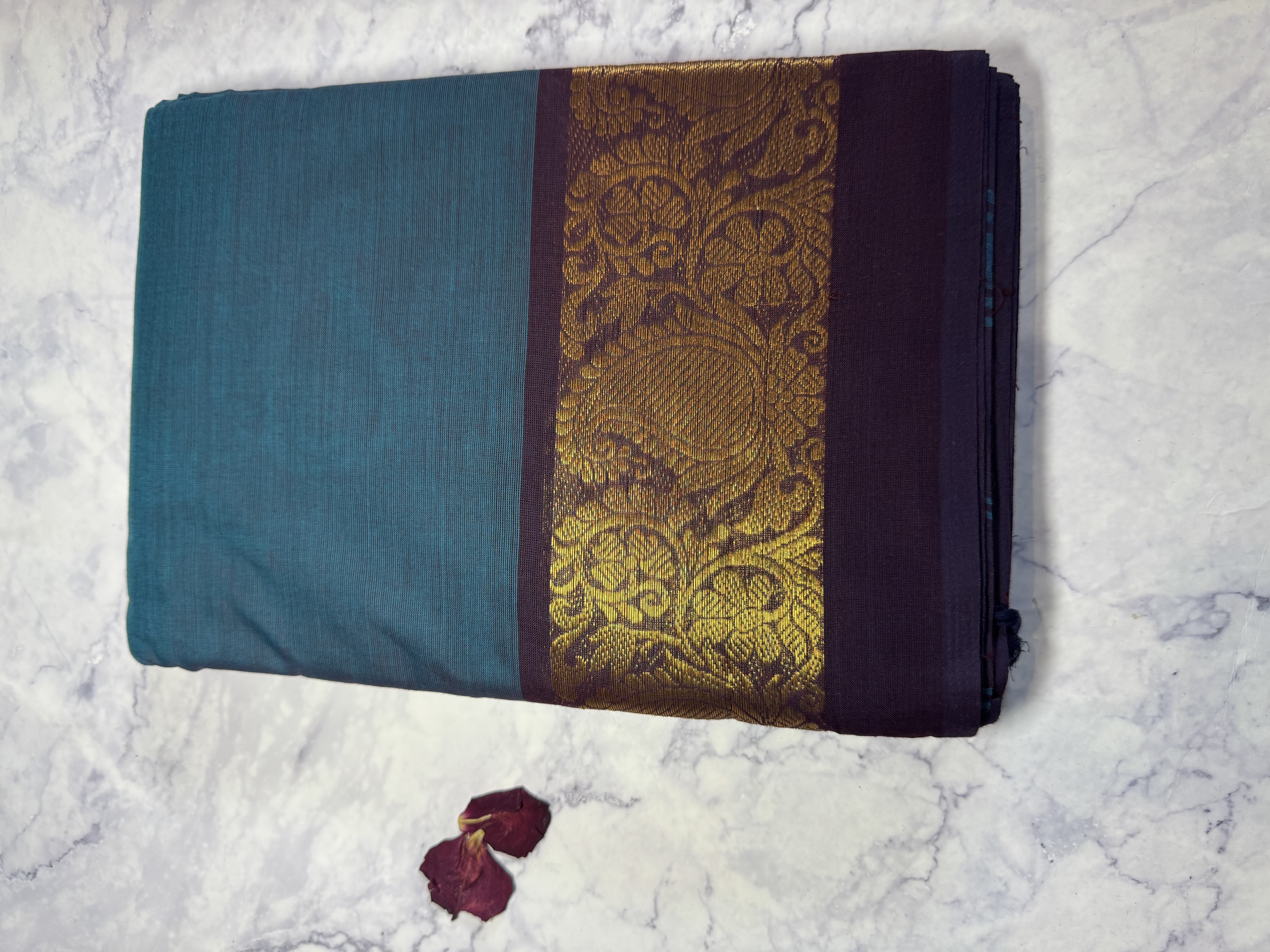 Teal cotton saree with navy border