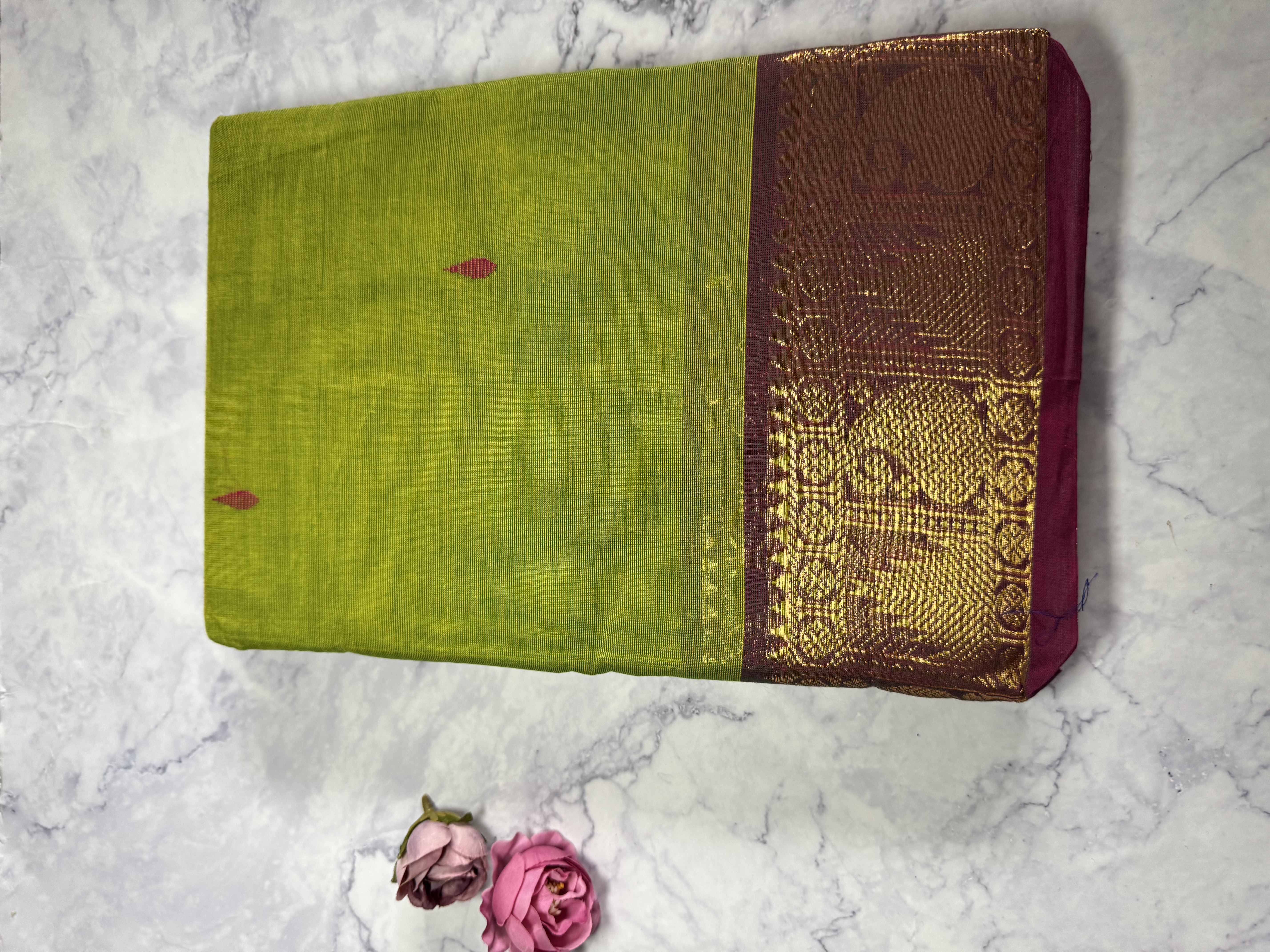 Parrot green cotton saree with pink border