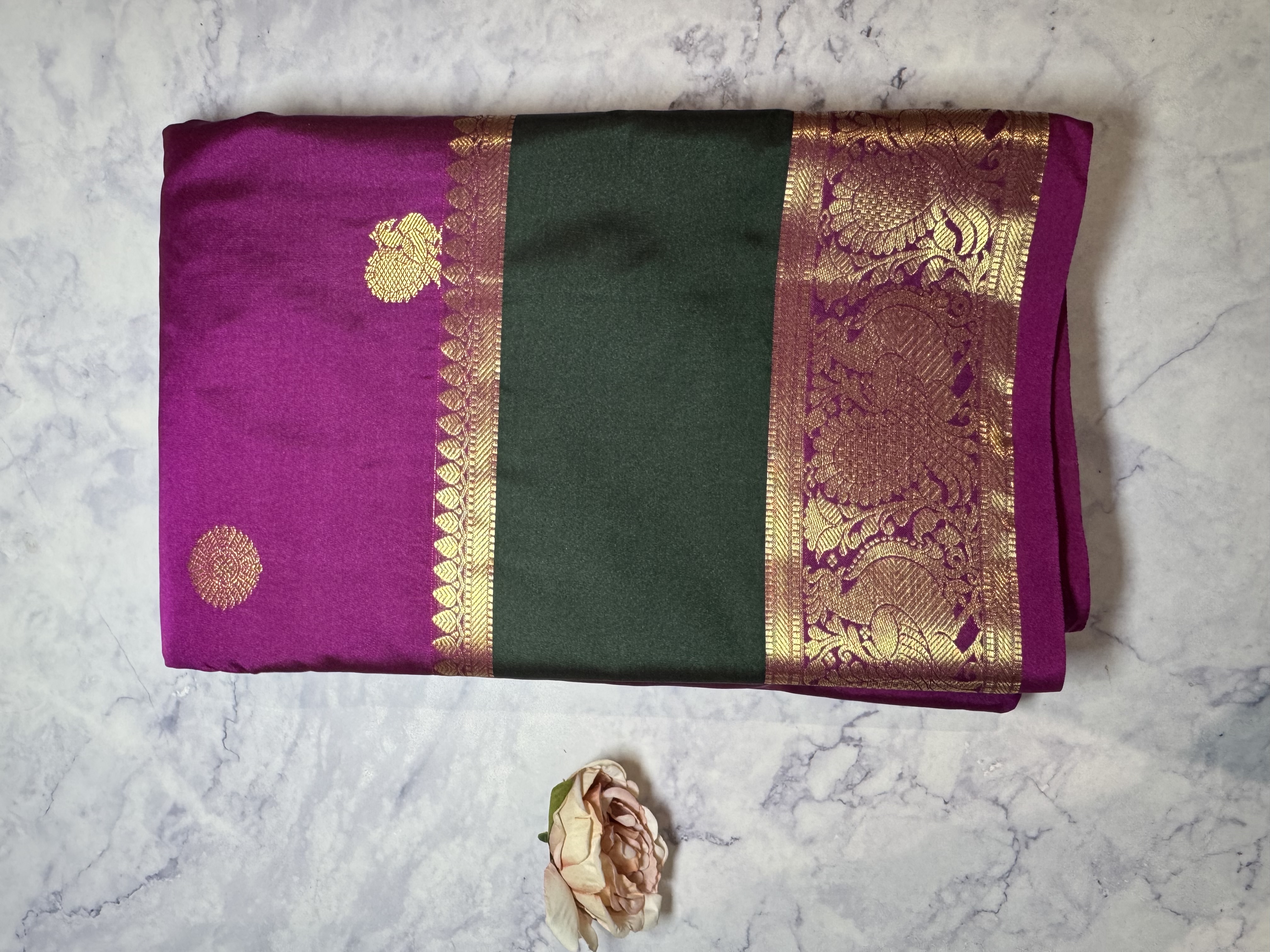 Magenta semi silk saree with emerald green gap border