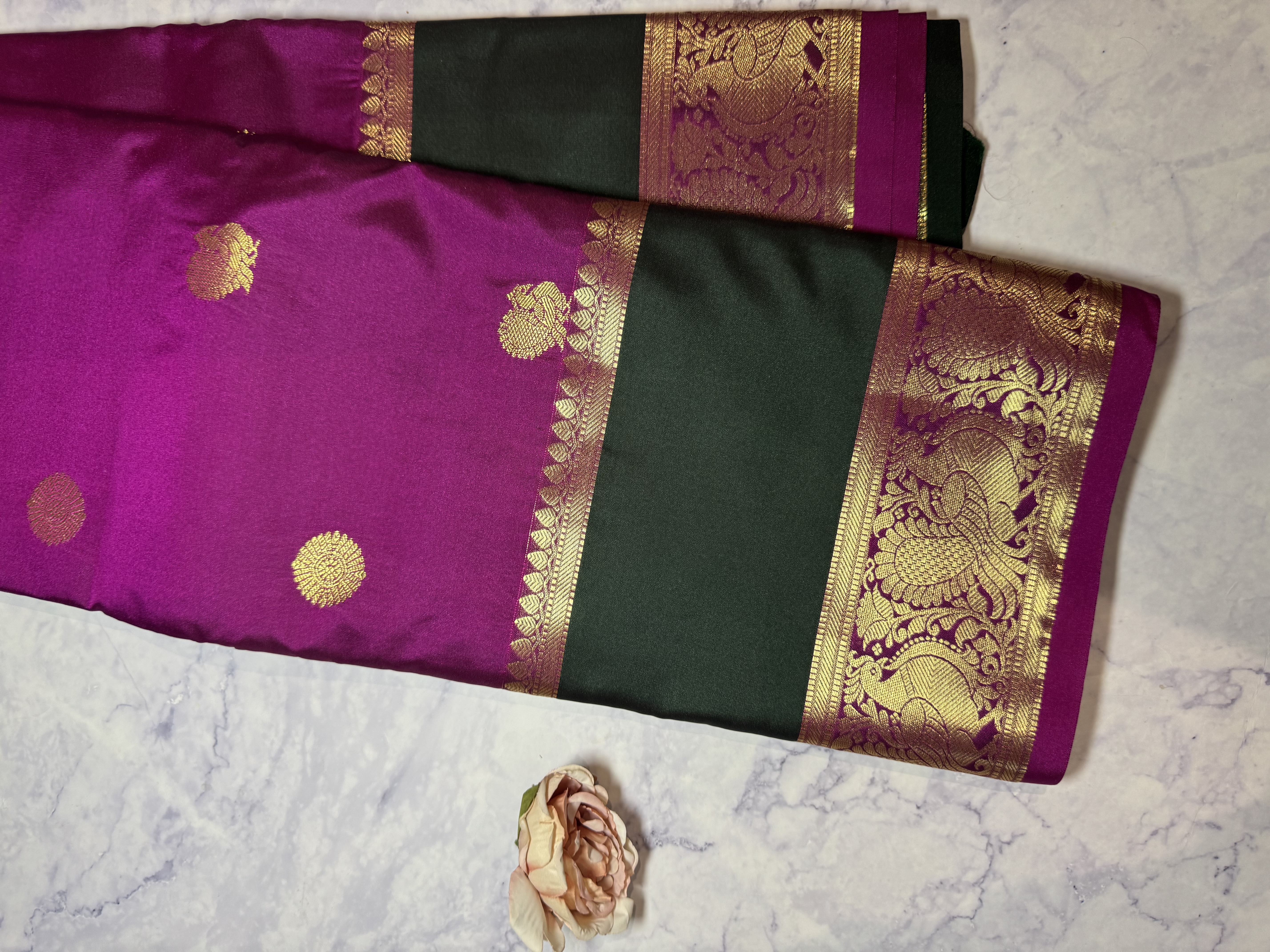 Magenta semi silk saree with emerald green gap border