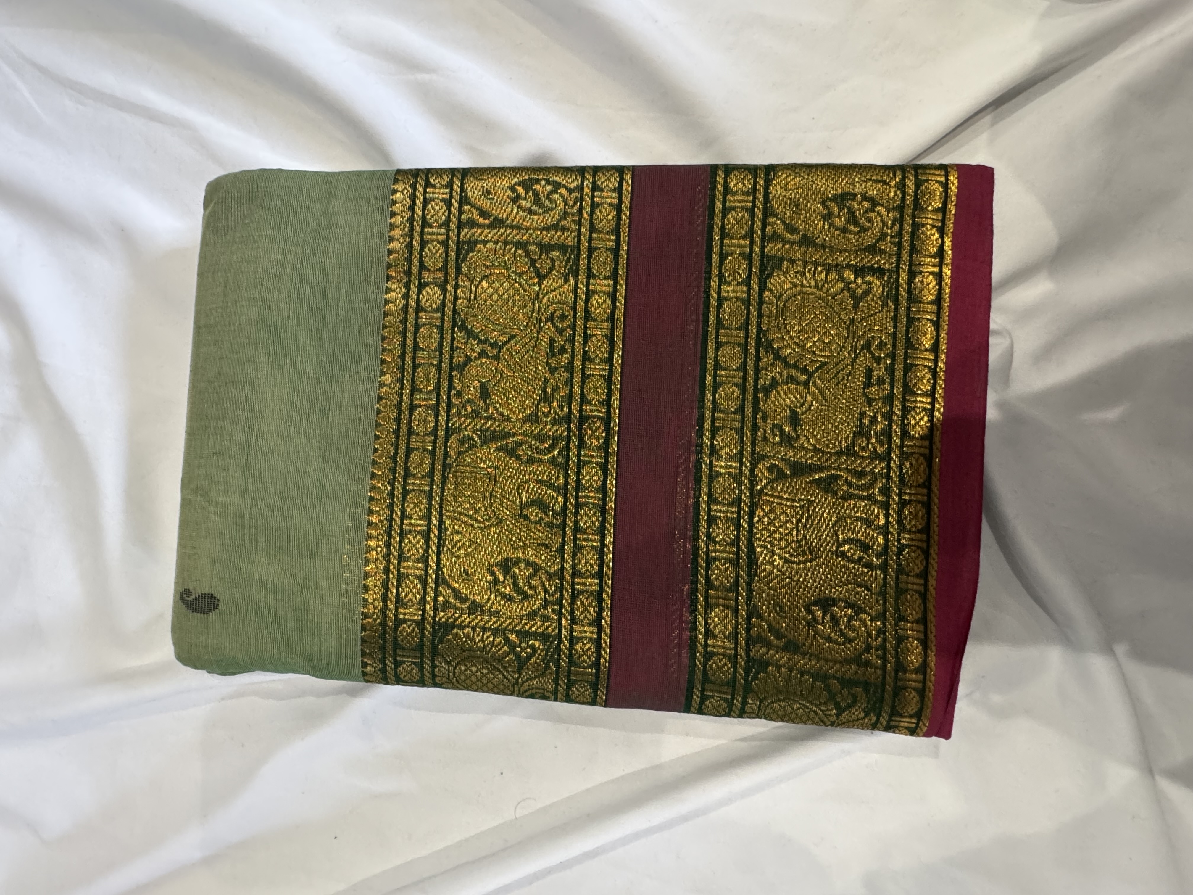 Pastel green cotton saree with pink border